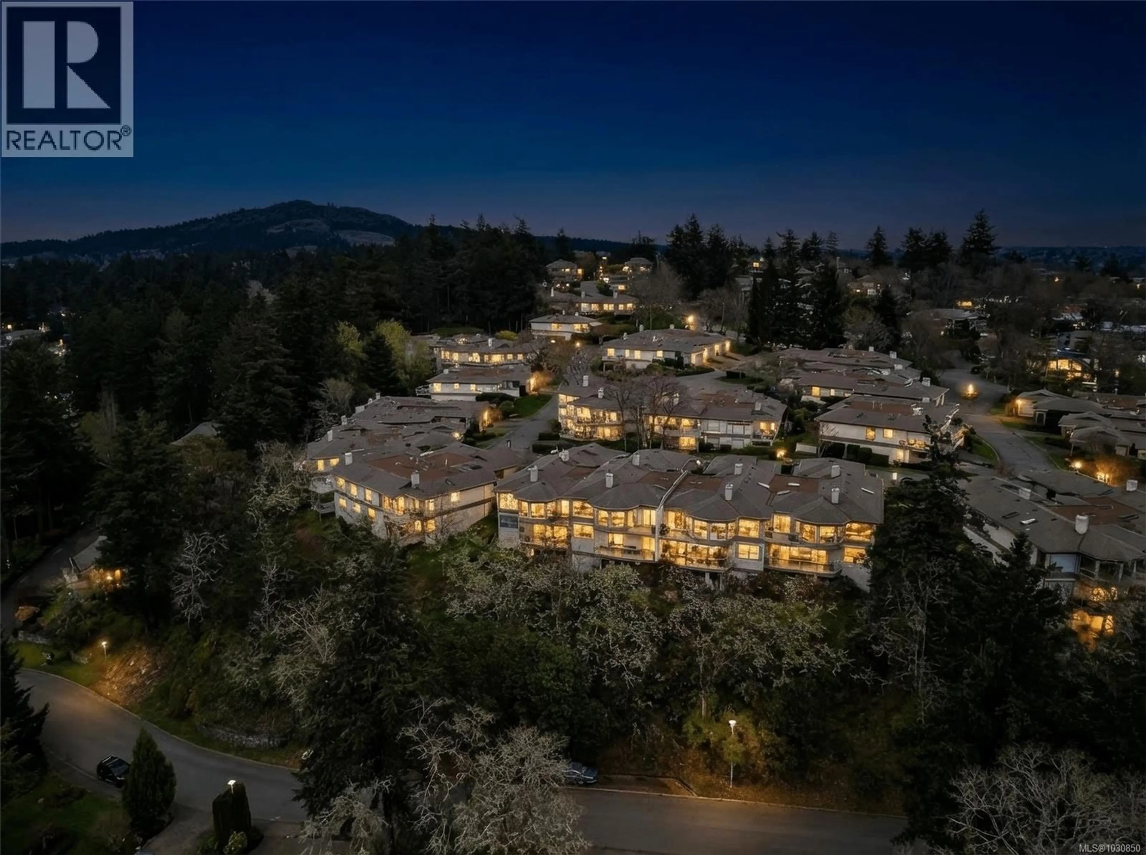 A pic from outside/outdoor area/front of a property/back of a property/a pic from drone, mountain view for 13 - 4300 STONEYWOOD LANE, Saanich British Columbia V8X5A5