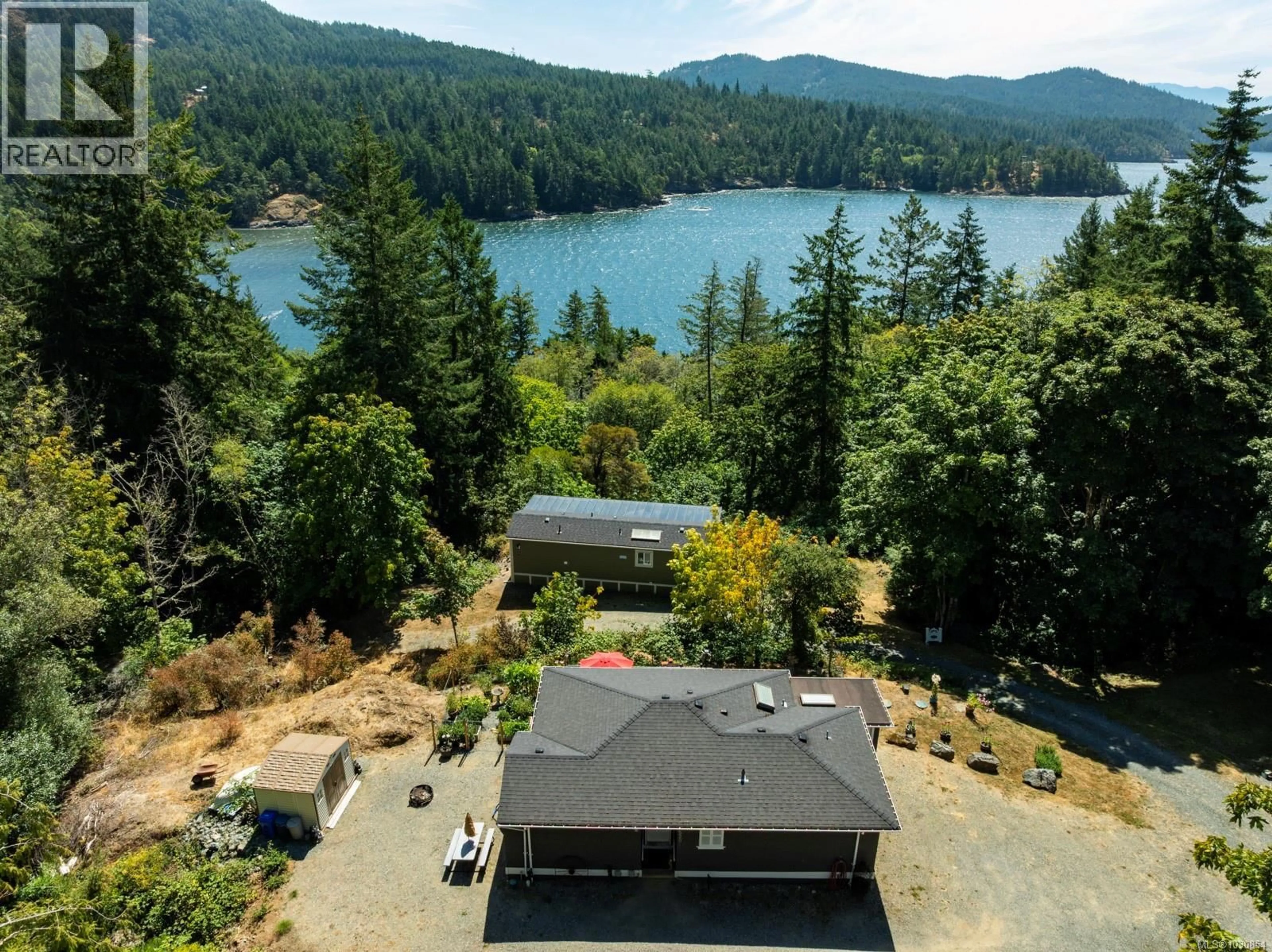 A pic from outside/outdoor area/front of a property/back of a property/a pic from drone, water/lake/river/ocean view for 5211 SOOKE ROAD, Sooke British Columbia V8V1L9