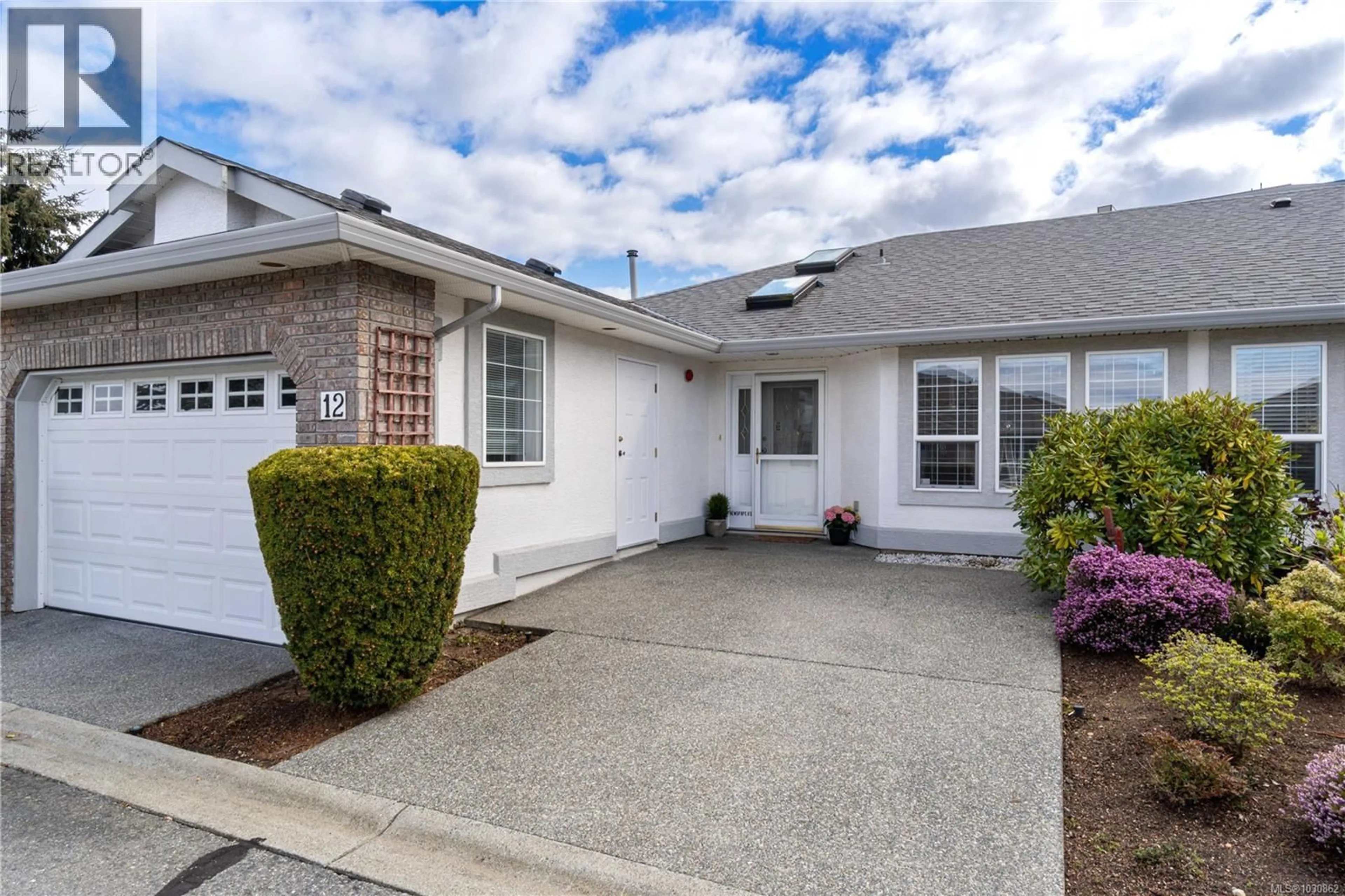 Home with vinyl exterior material, street for 12 - 6595 GROVELAND DRIVE, Nanaimo British Columbia V9V1S6