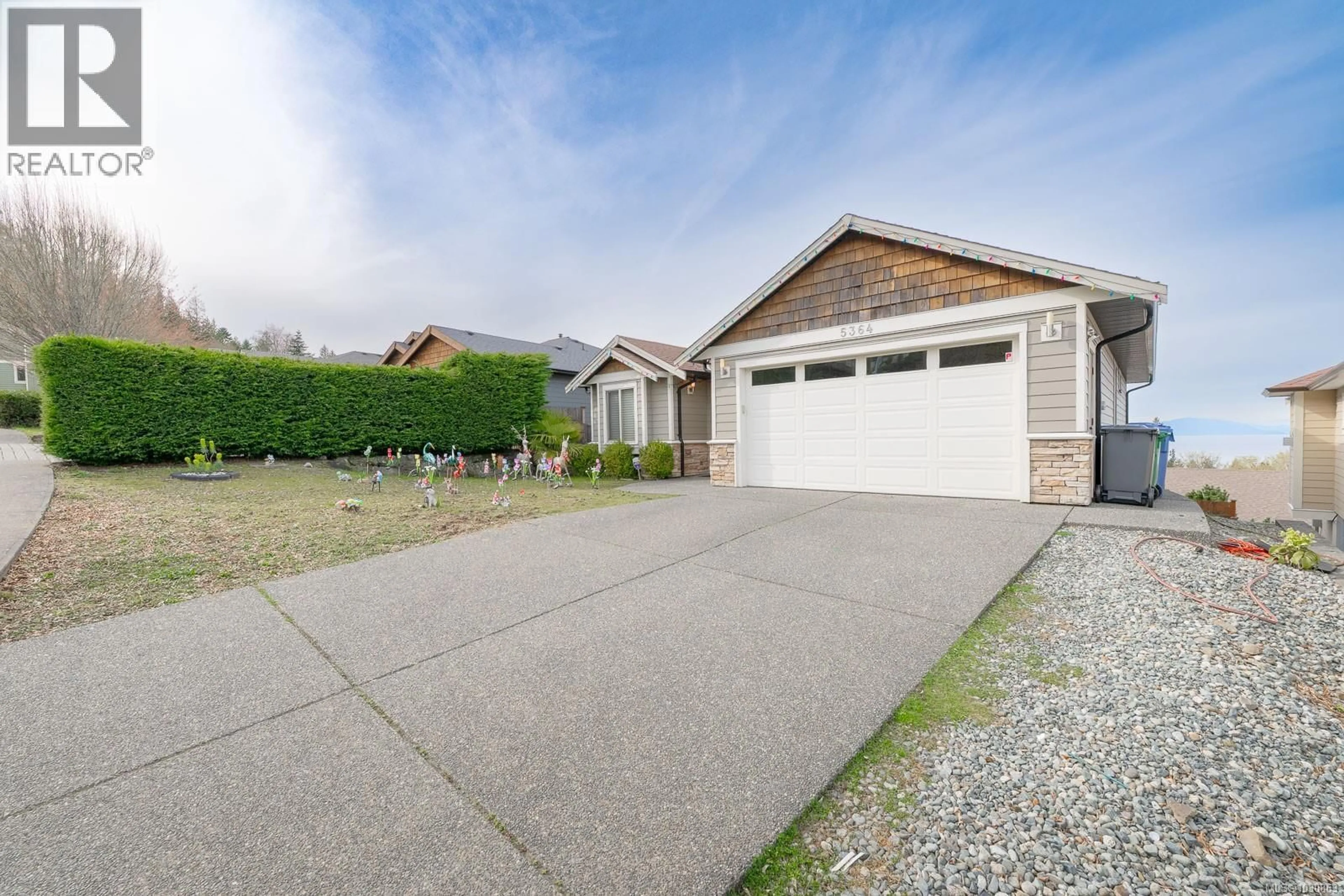 A pic from outside/outdoor area/front of a property/back of a property/a pic from drone, street for 5364 LAGUNA WAY, Nanaimo British Columbia V9T0B8