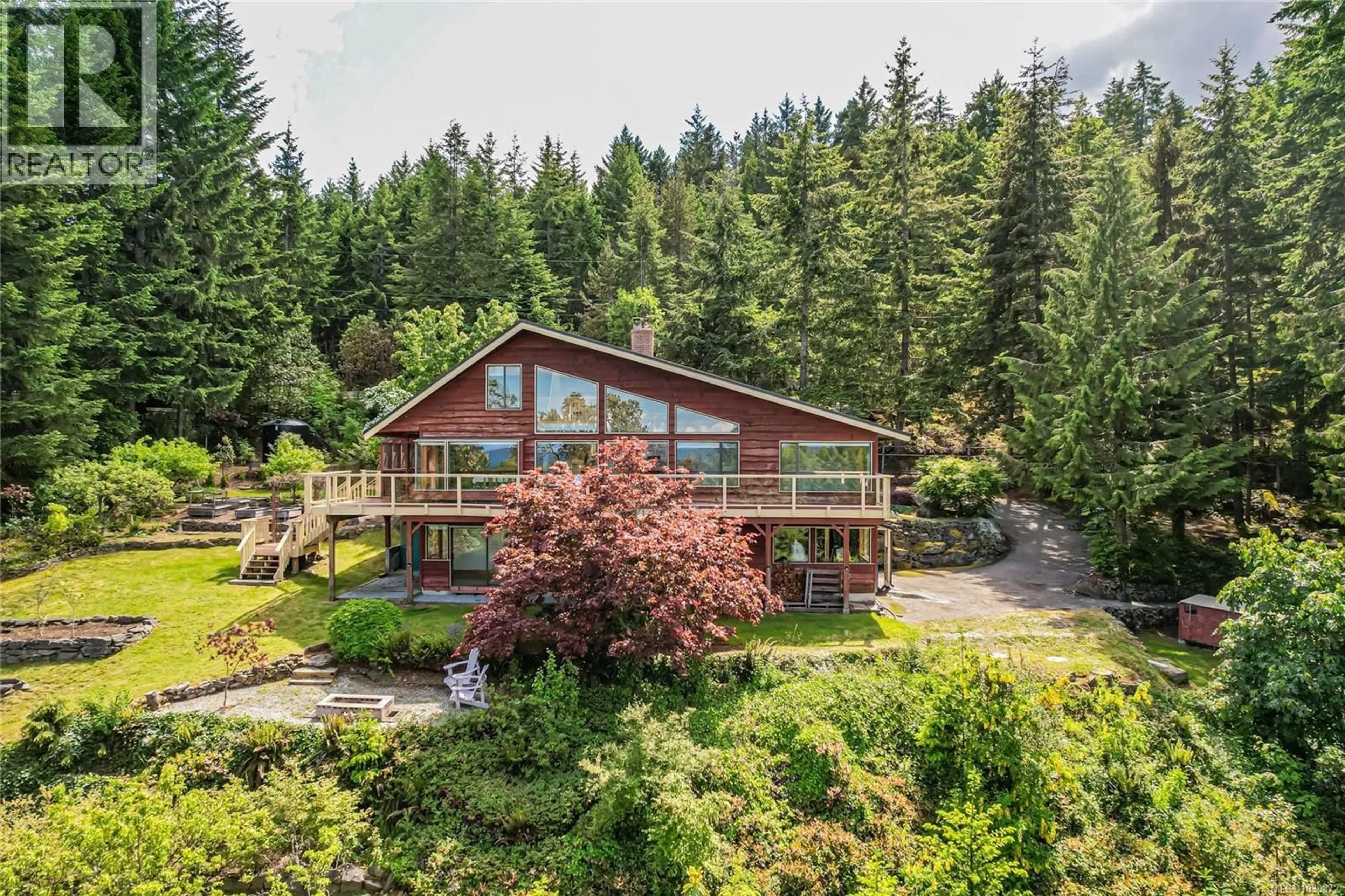 A pic from outside/outdoor area/front of a property/back of a property/a pic from drone, forest/trees view for 200 WILKIE WAY, Salt Spring British Columbia V8K2J4
