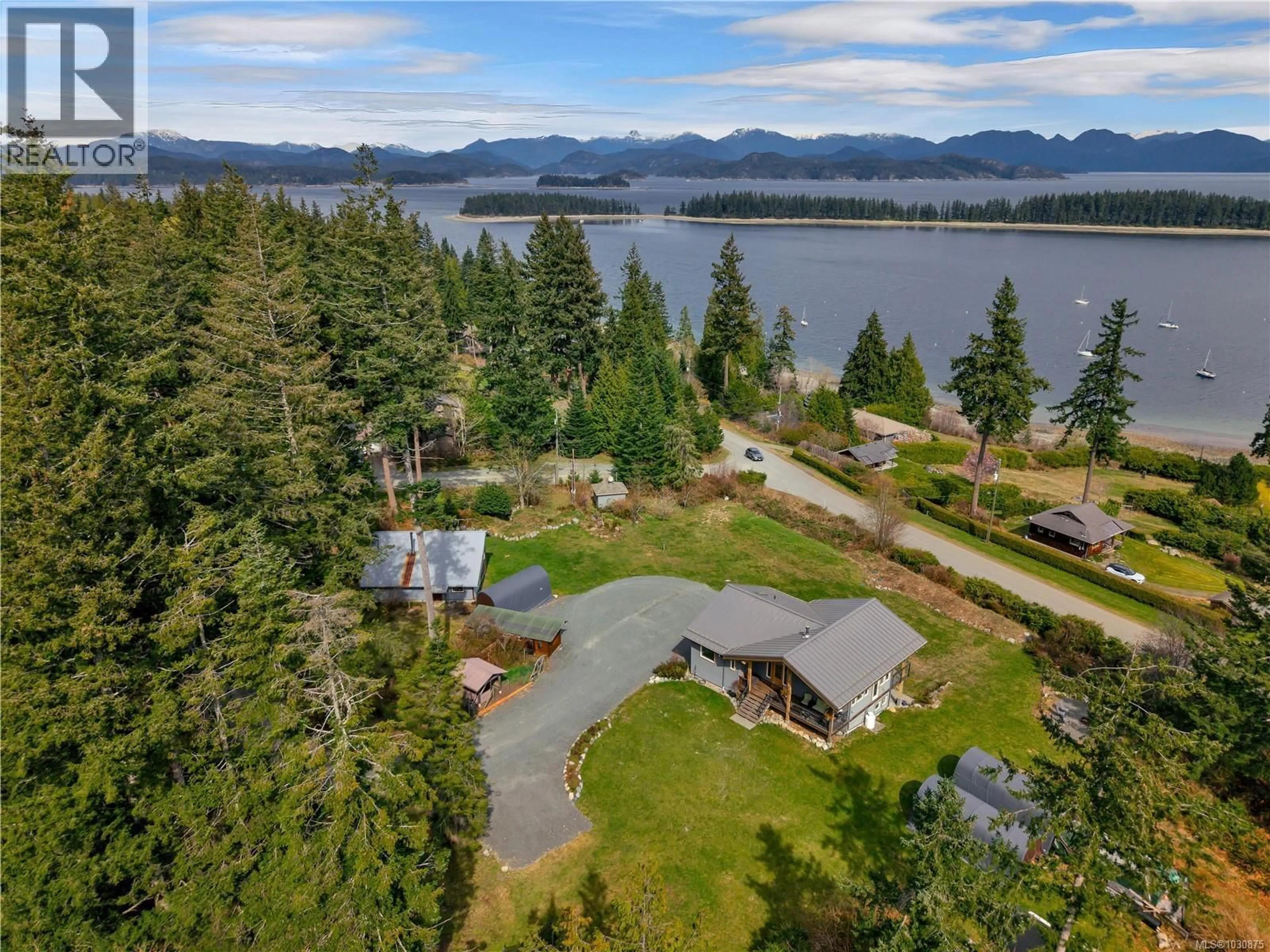 A pic from outside/outdoor area/front of a property/back of a property/a pic from drone, water/lake/river/ocean view for 609 VALPY ROAD, Quadra Island British Columbia V0P1N0