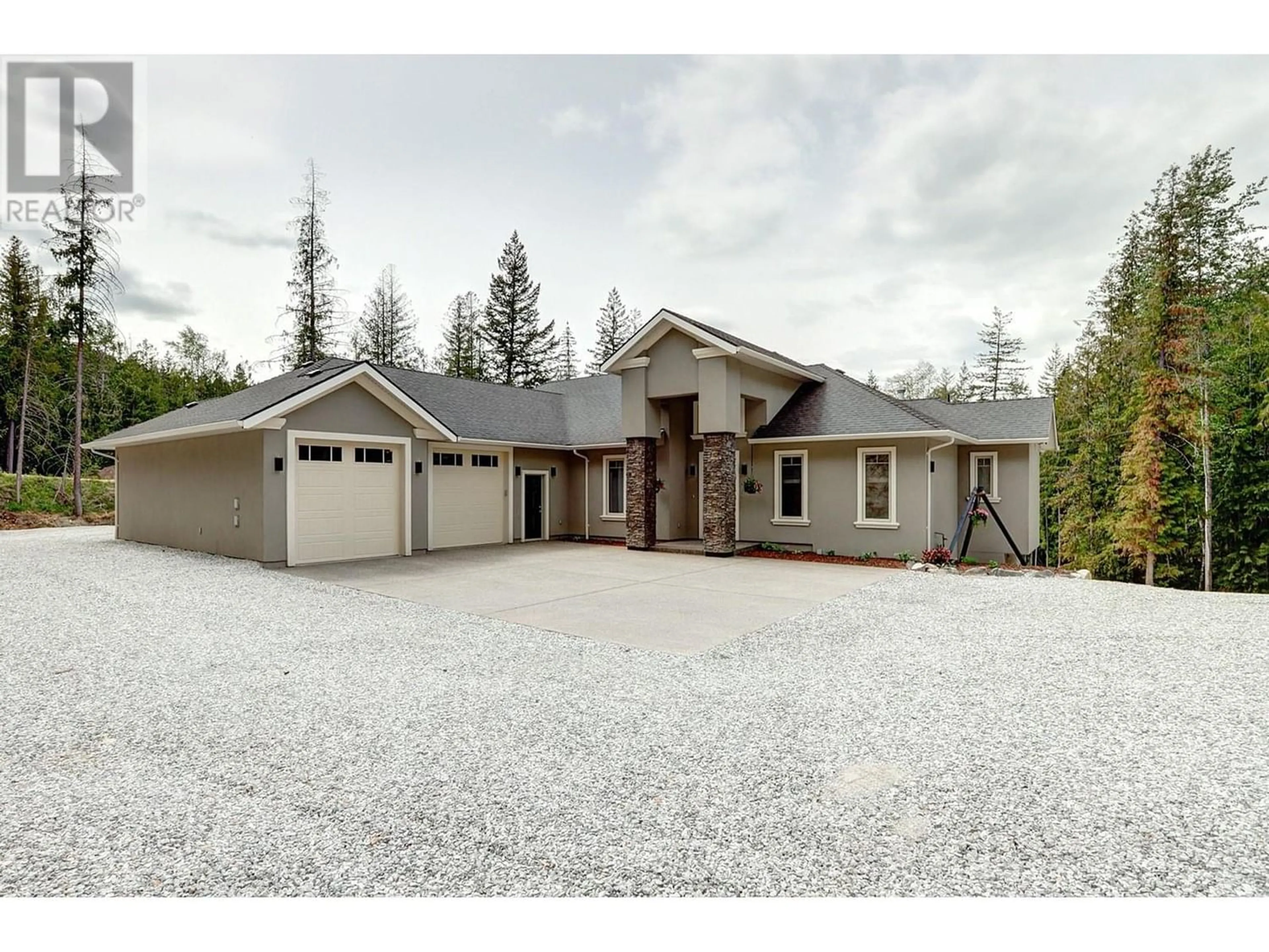 Frontside or backside of a home for 7180 Dixon Dam Road, Vernon British Columbia V1B3N9