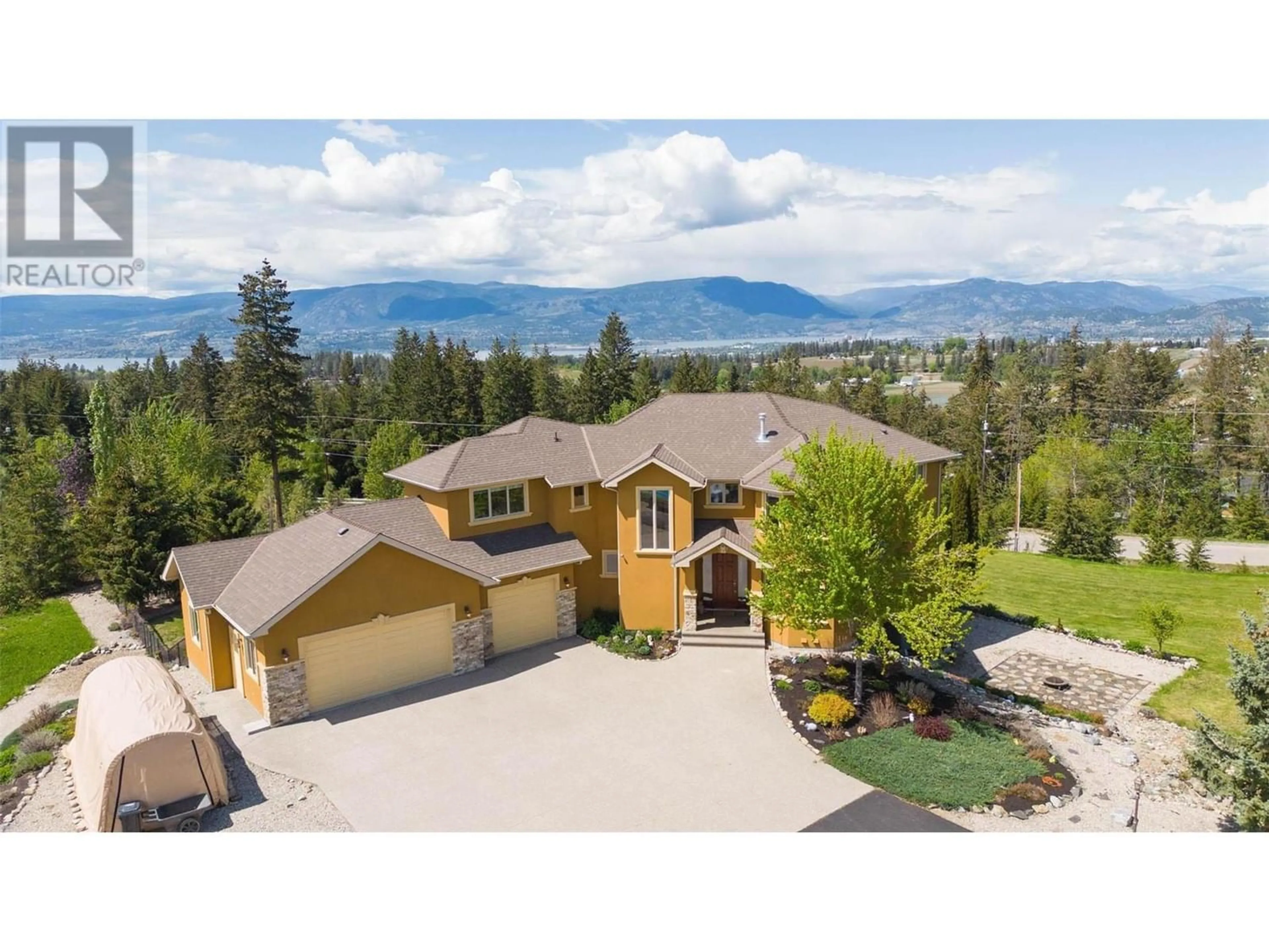 Frontside or backside of a home for 2735 Harvard Road, Kelowna British Columbia V1W4C2