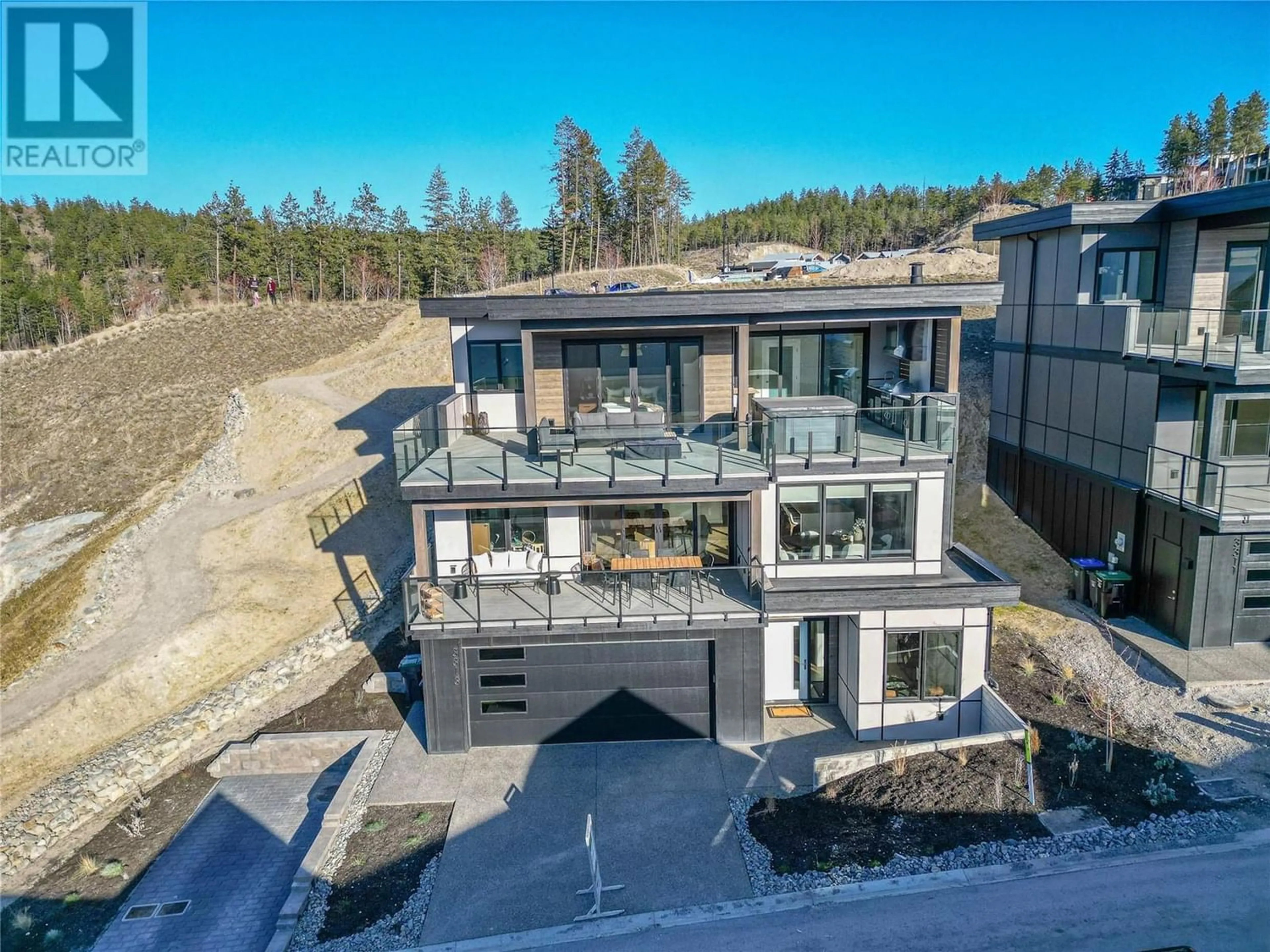 Frontside or backside of a home for 3313 Aspen Lane, Kelowna British Columbia V1V0C6