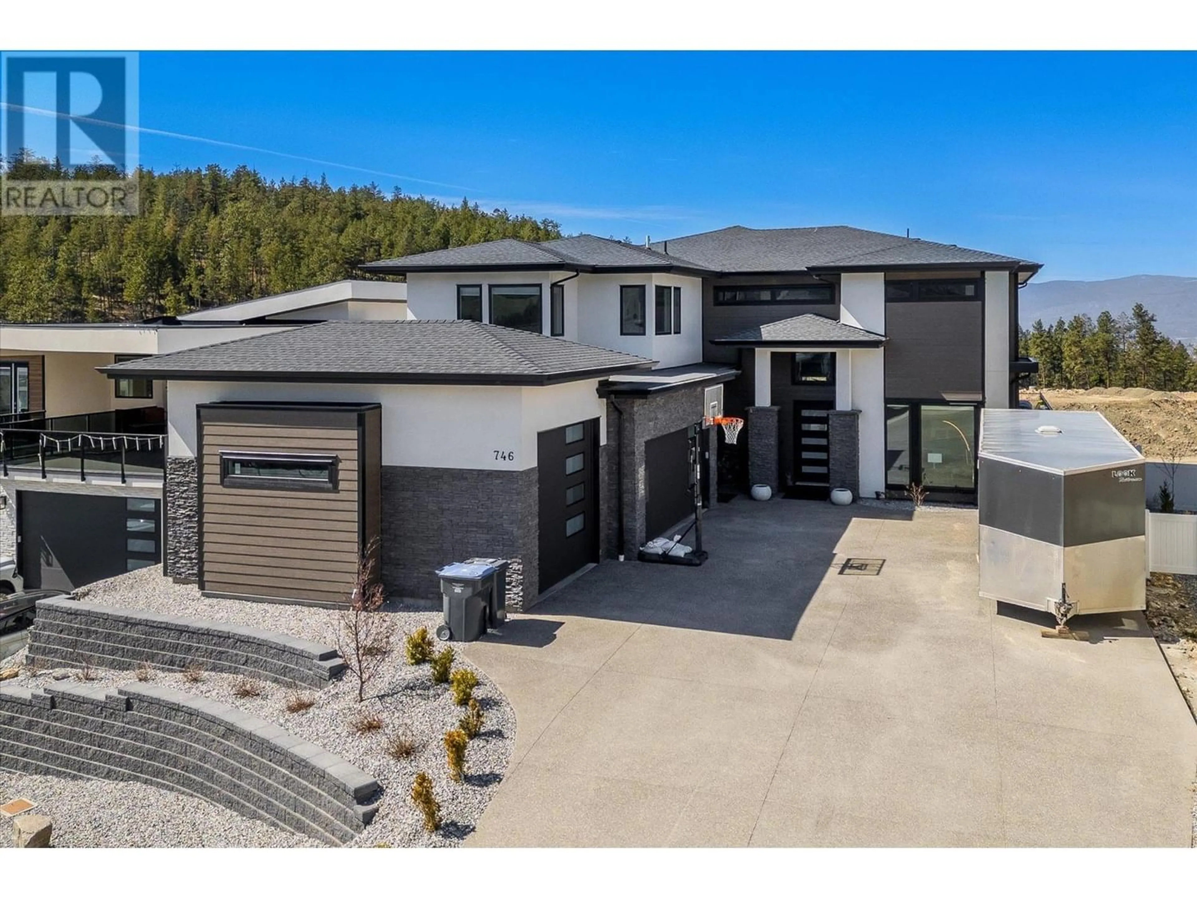 Frontside or backside of a home for 746 Carnoustie Drive, Kelowna British Columbia V1P1V2