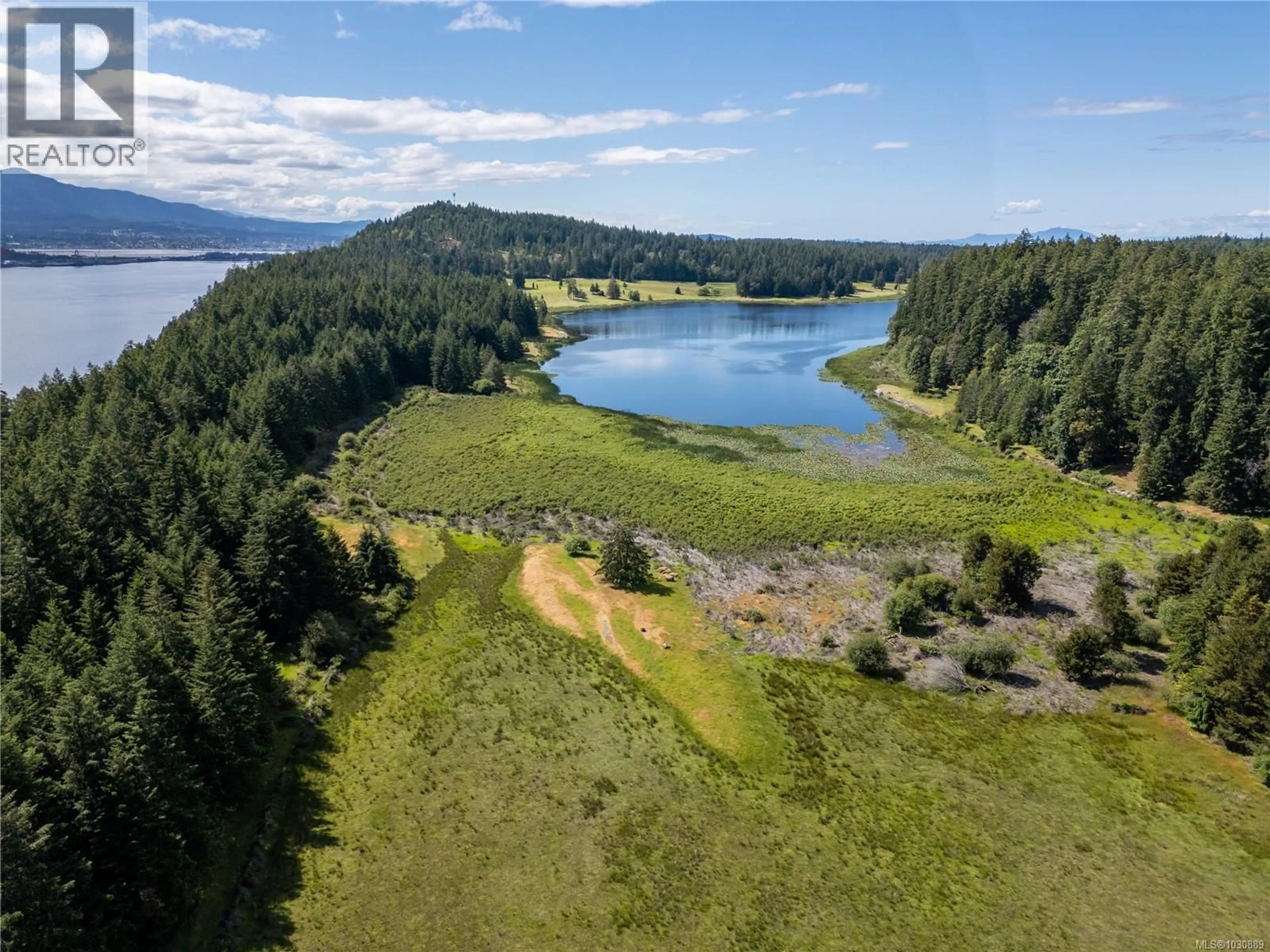 A pic from outside/outdoor area/front of a property/back of a property/a pic from drone, water/lake/river/ocean view for 909 SOUTH ROAD, Gabriola Island British Columbia V0R1X0