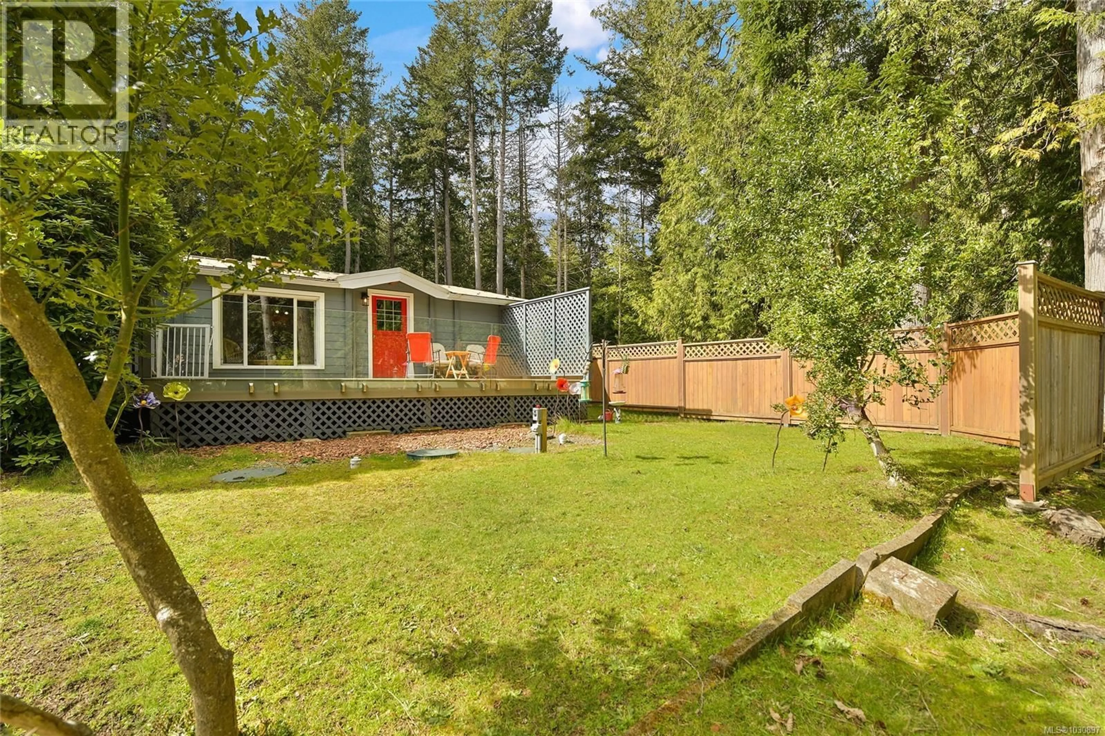 A pic from outside/outdoor area/front of a property/back of a property/a pic from drone, forest/trees view for 514 AYA REACH ROAD, Mayne Island British Columbia V0N2J2