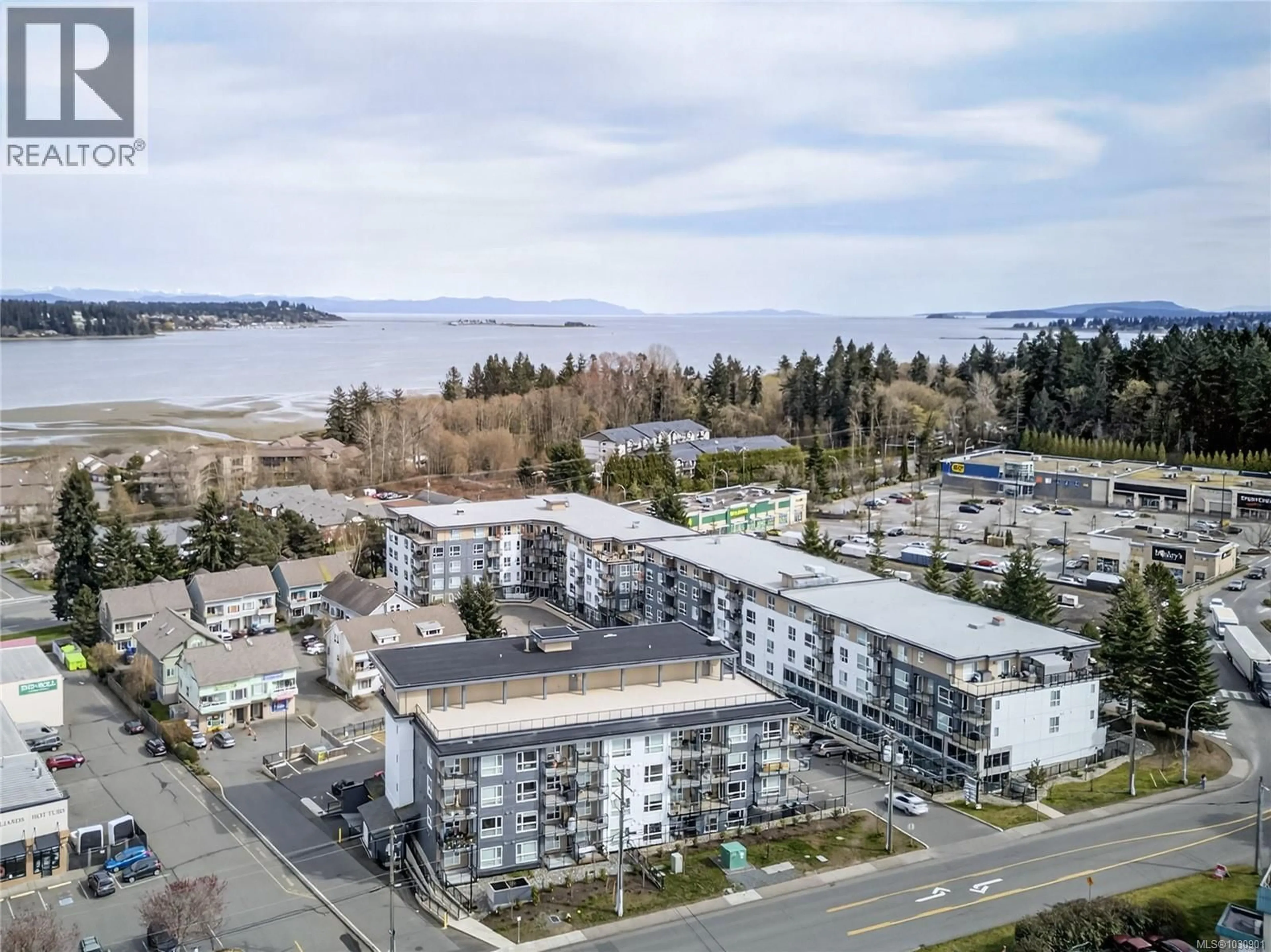 A pic from outside/outdoor area/front of a property/back of a property/a pic from drone, water/lake/river/ocean view for 216 - 3070 KILPATRICK AVENUE, Courtenay British Columbia V9N0G7