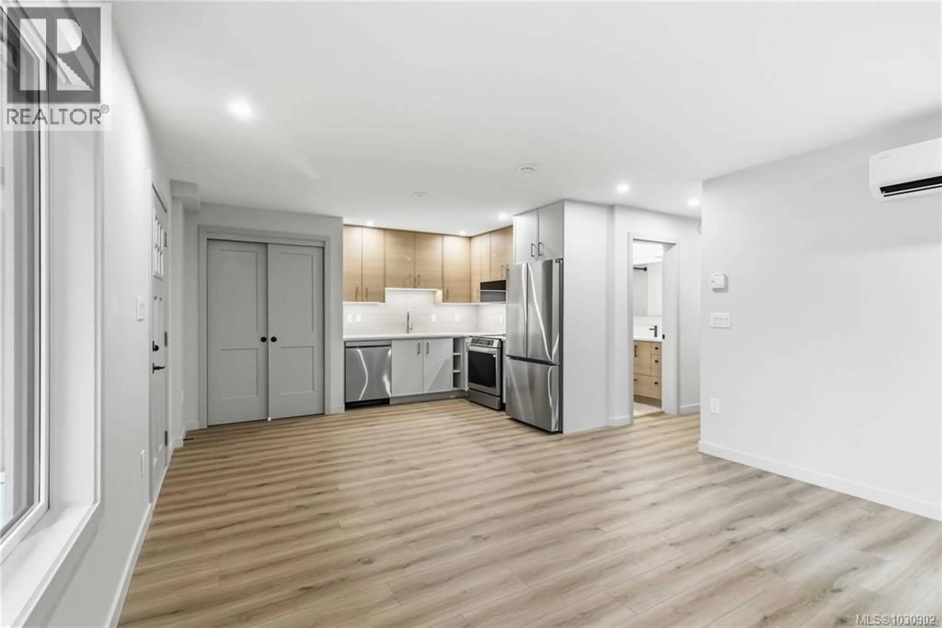 Open concept kitchen, wood/laminate floor for 1 - 1789 EMERSON STREET, Victoria British Columbia V8R2C2