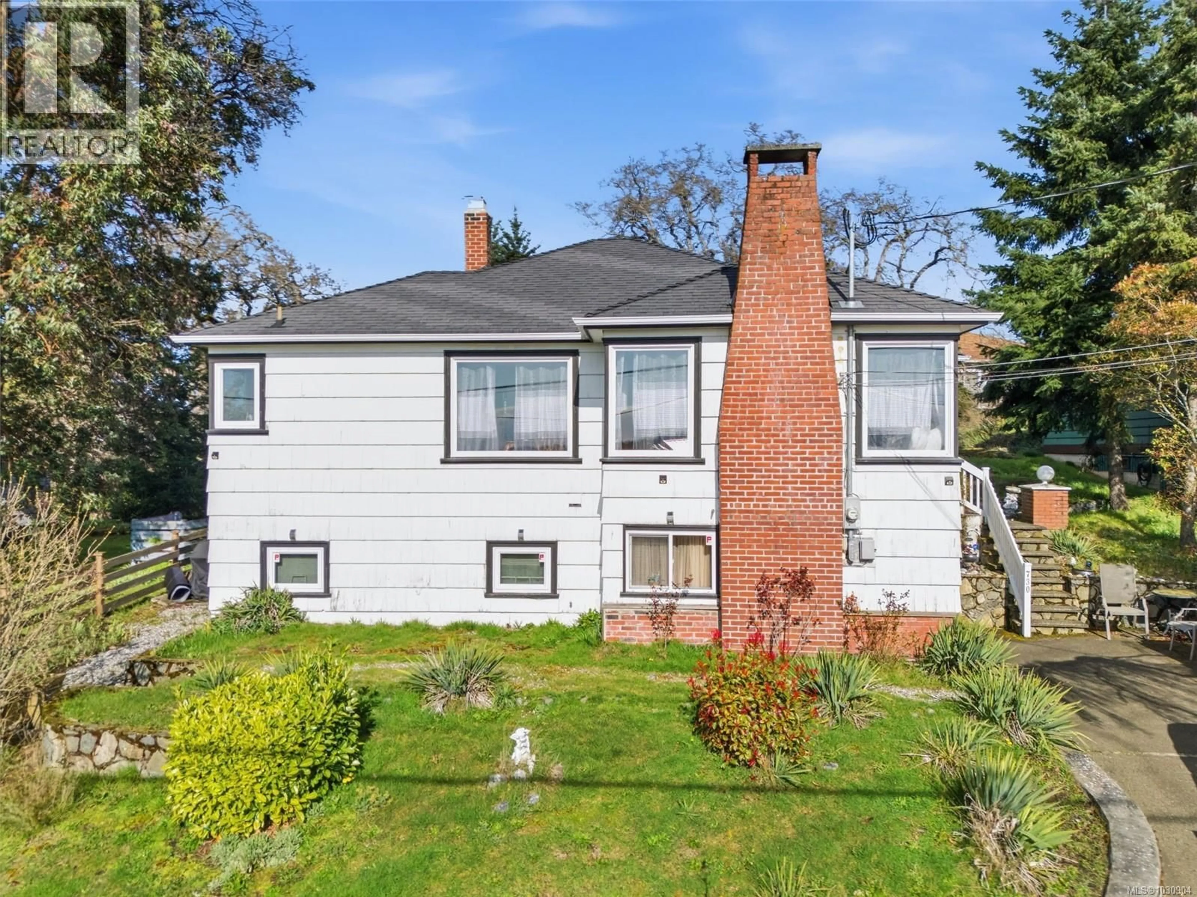 A pic from outside/outdoor area/front of a property/back of a property/a pic from drone, street for 730 BURNSIDE ROAD WEST, Saanich British Columbia V8Z1N1