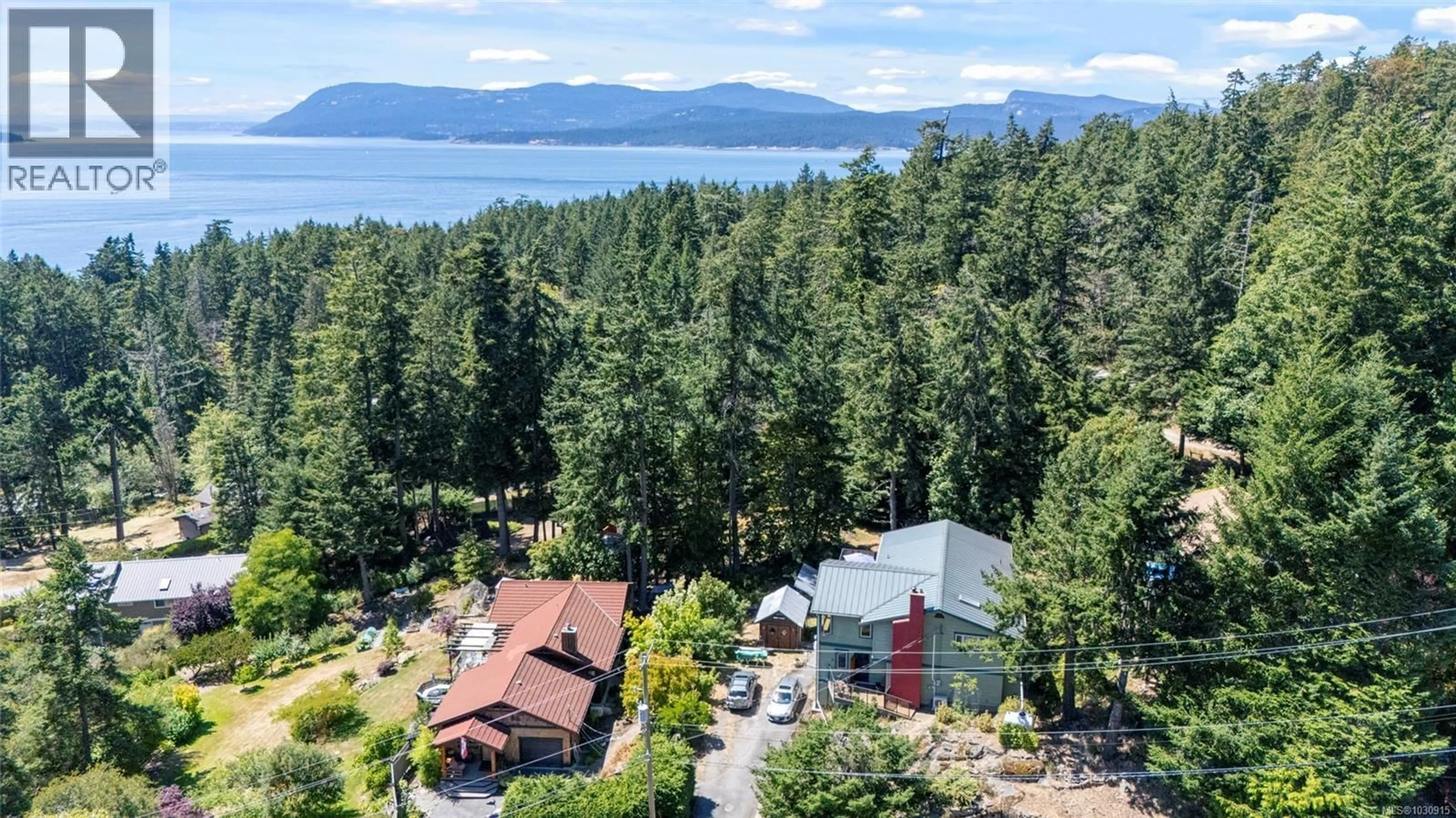 A pic from outside/outdoor area/front of a property/back of a property/a pic from drone, water/lake/river/ocean view for 3705 SIGNAL HILL ROAD, Pender Island British Columbia V0N2M0