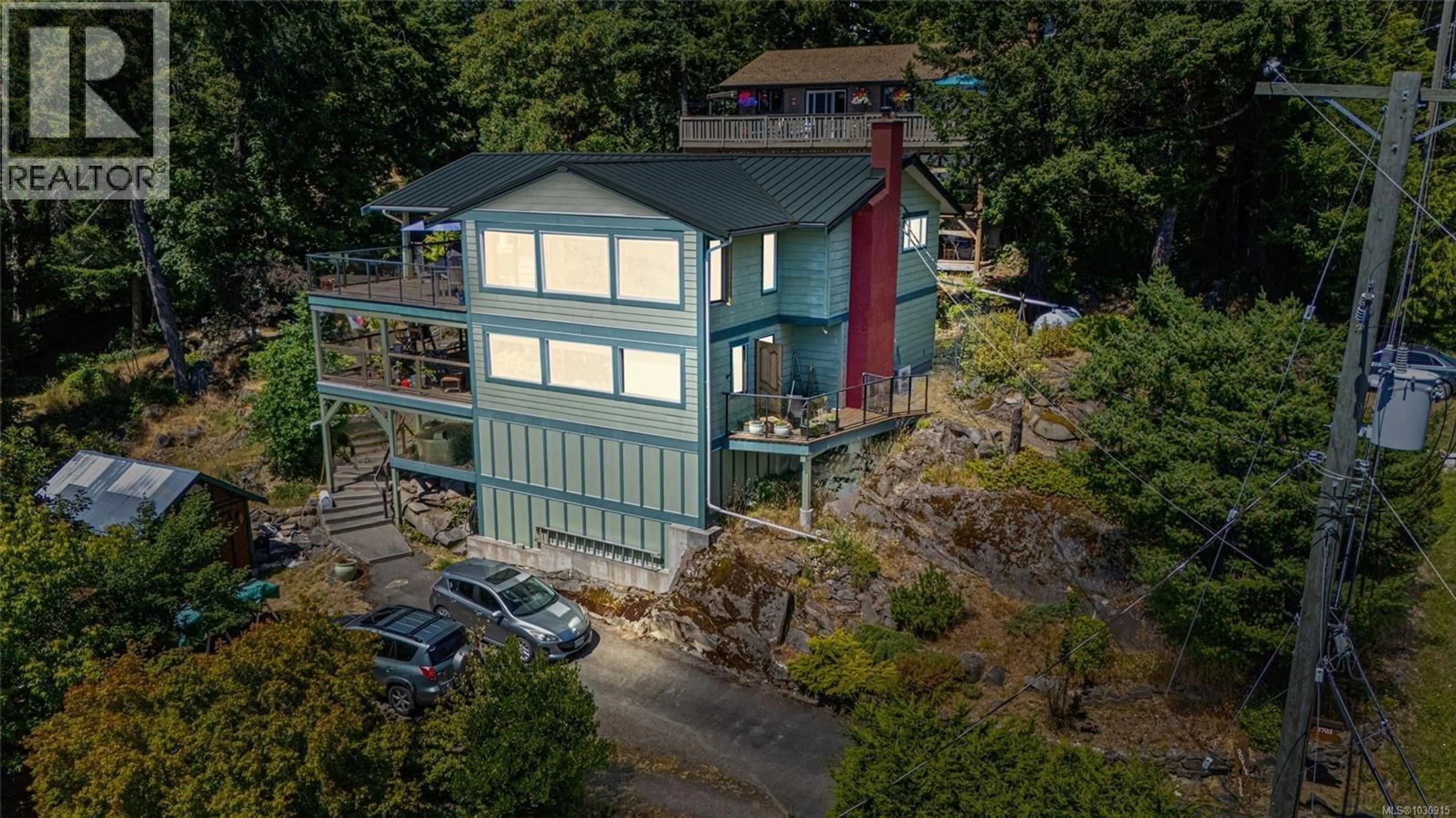 A pic from outside/outdoor area/front of a property/back of a property/a pic from drone, building for 3705 SIGNAL HILL ROAD, Pender Island British Columbia V0N2M0