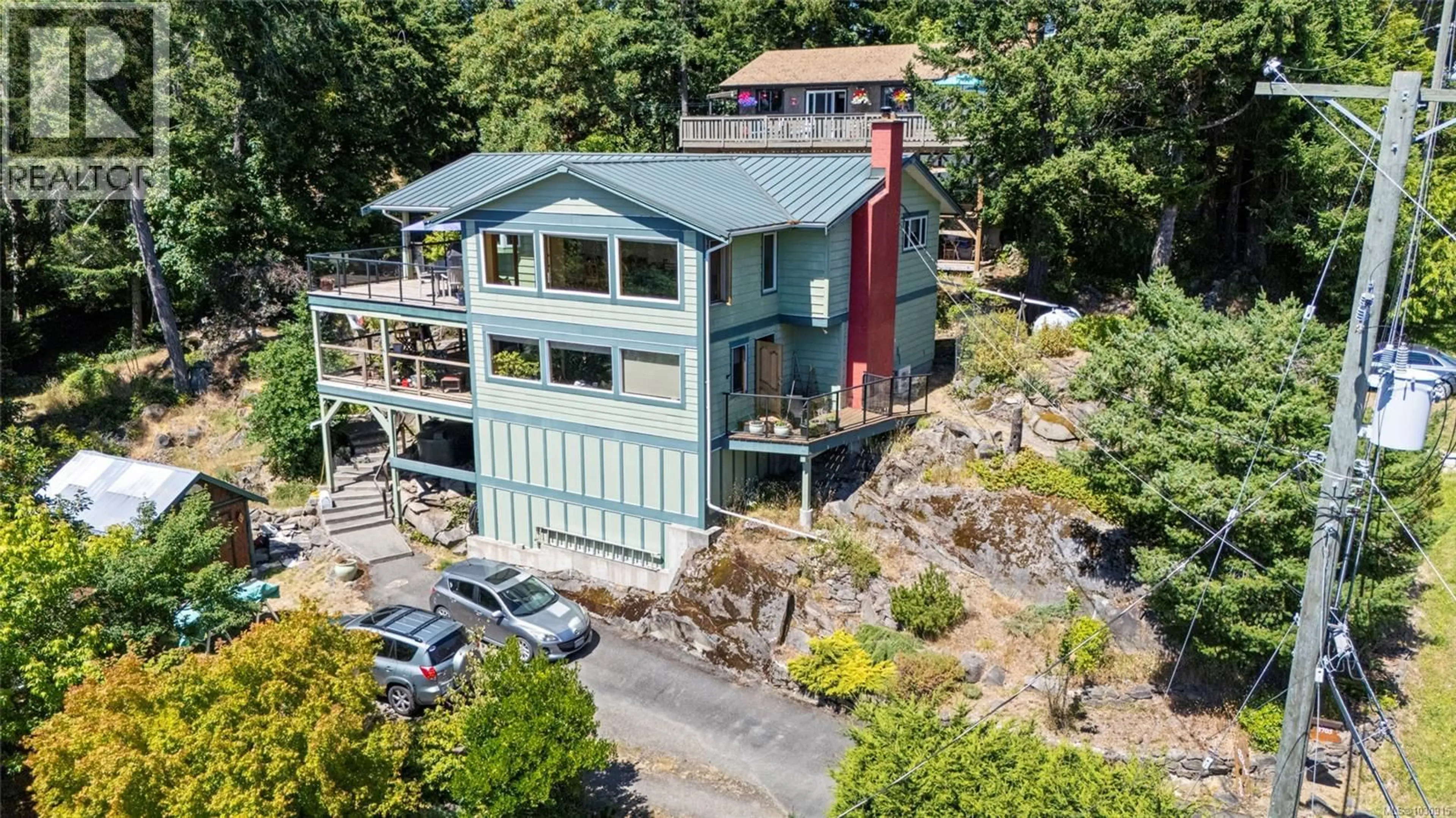 A pic from outside/outdoor area/front of a property/back of a property/a pic from drone, building for 3705 SIGNAL HILL ROAD, Pender Island British Columbia V0N2M0