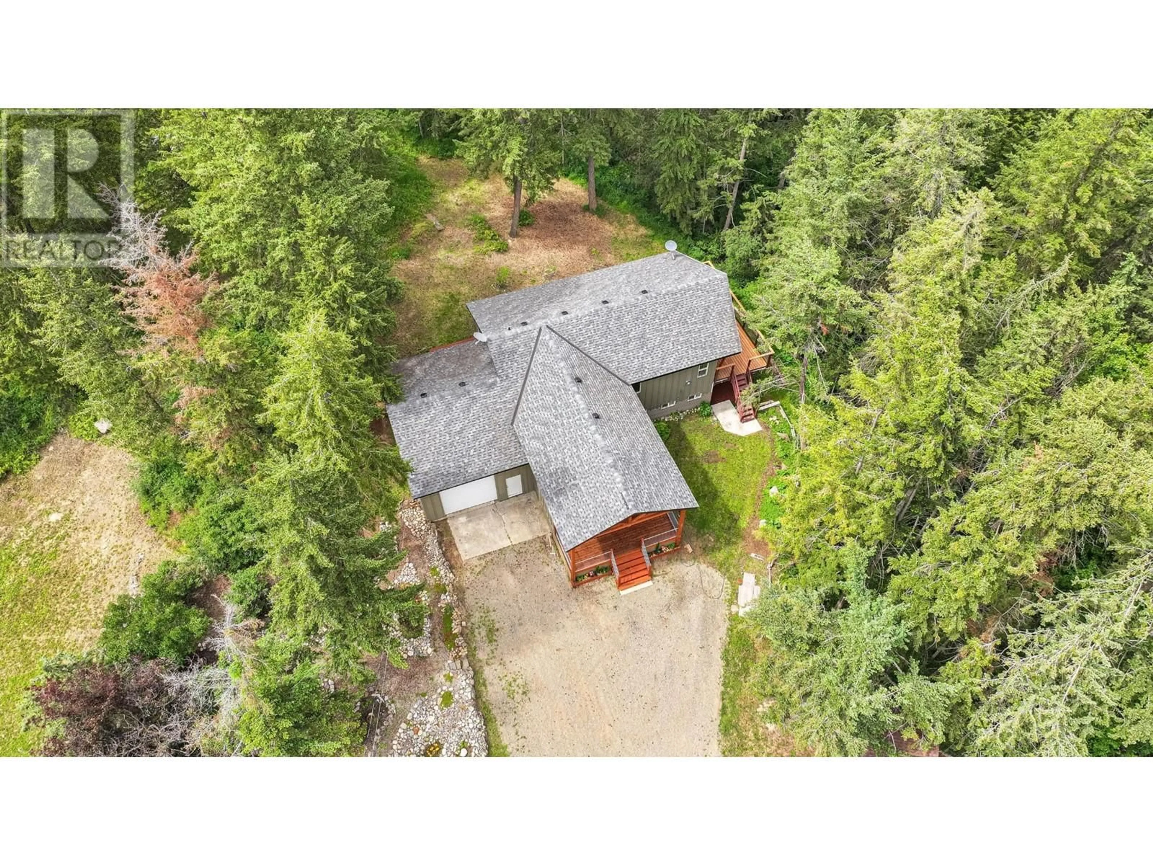 A pic from outside/outdoor area/front of a property/back of a property/a pic from drone, forest/trees view for 4598 CEDAR HILL ROAD, Falkland British Columbia V0E1W1