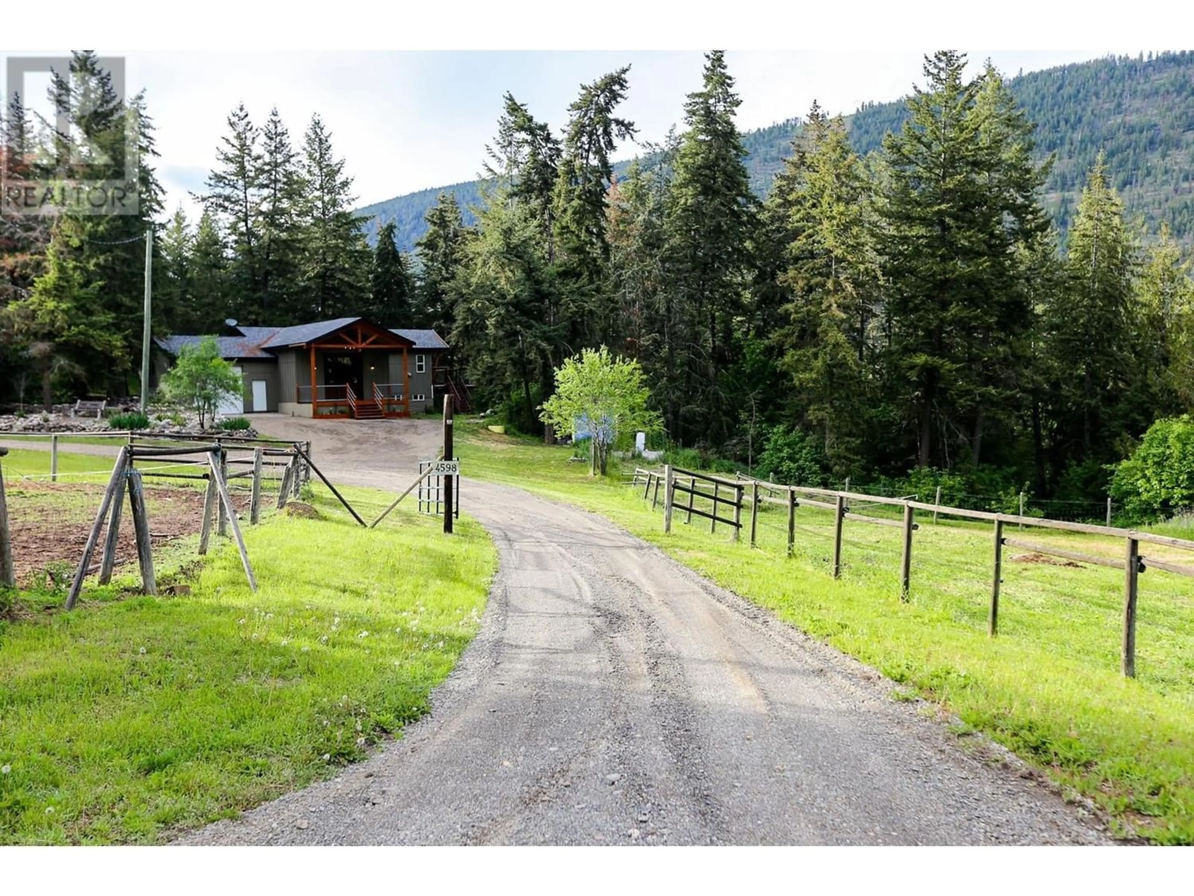 A pic from outside/outdoor area/front of a property/back of a property/a pic from drone, mountain view for 4598 Cedar Hill Road, Falkland British Columbia V0E1W1