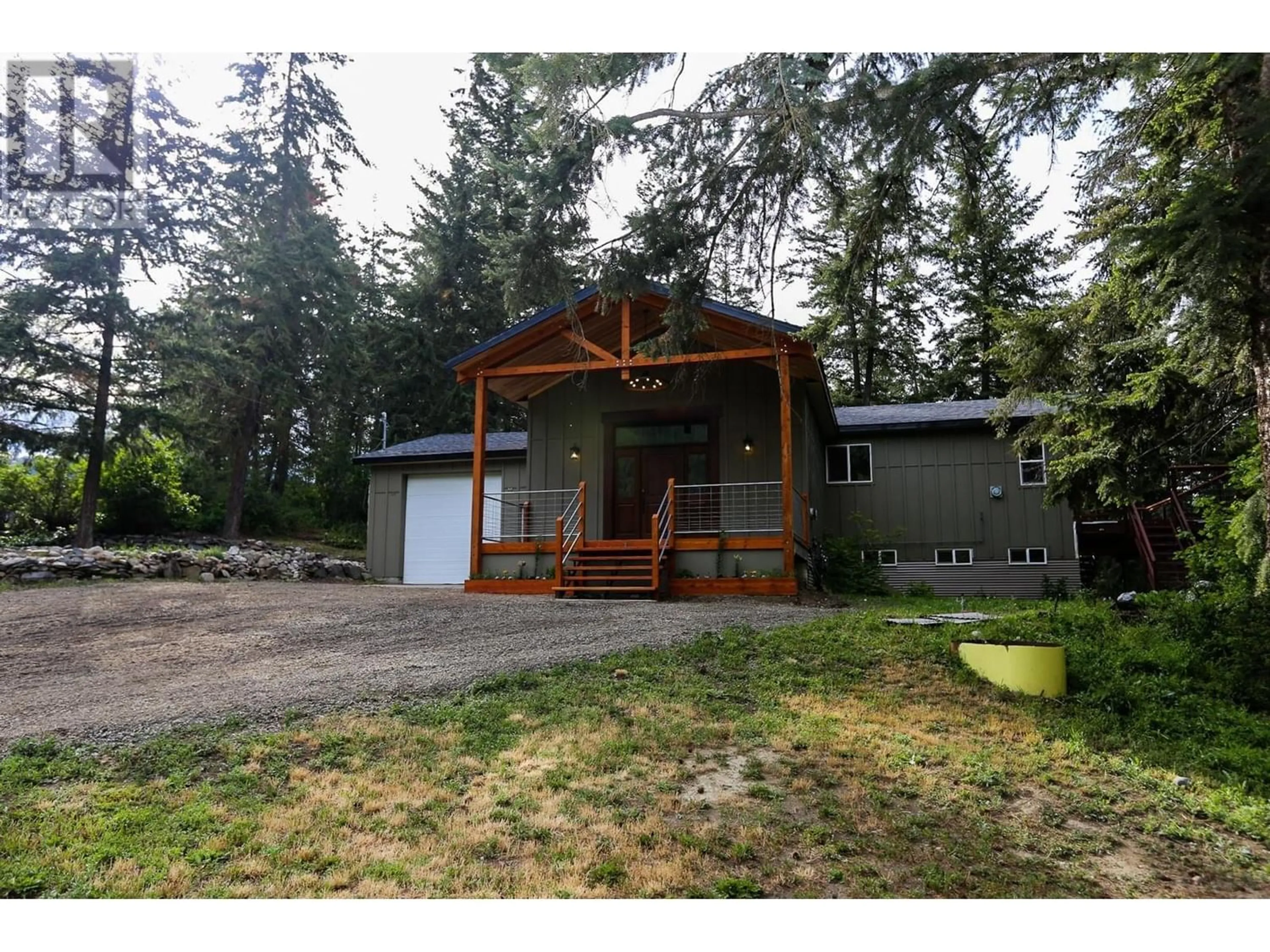 A pic from outside/outdoor area/front of a property/back of a property/a pic from drone, forest/trees view for 4598 Cedar Hill Road, Falkland British Columbia V0E1W1