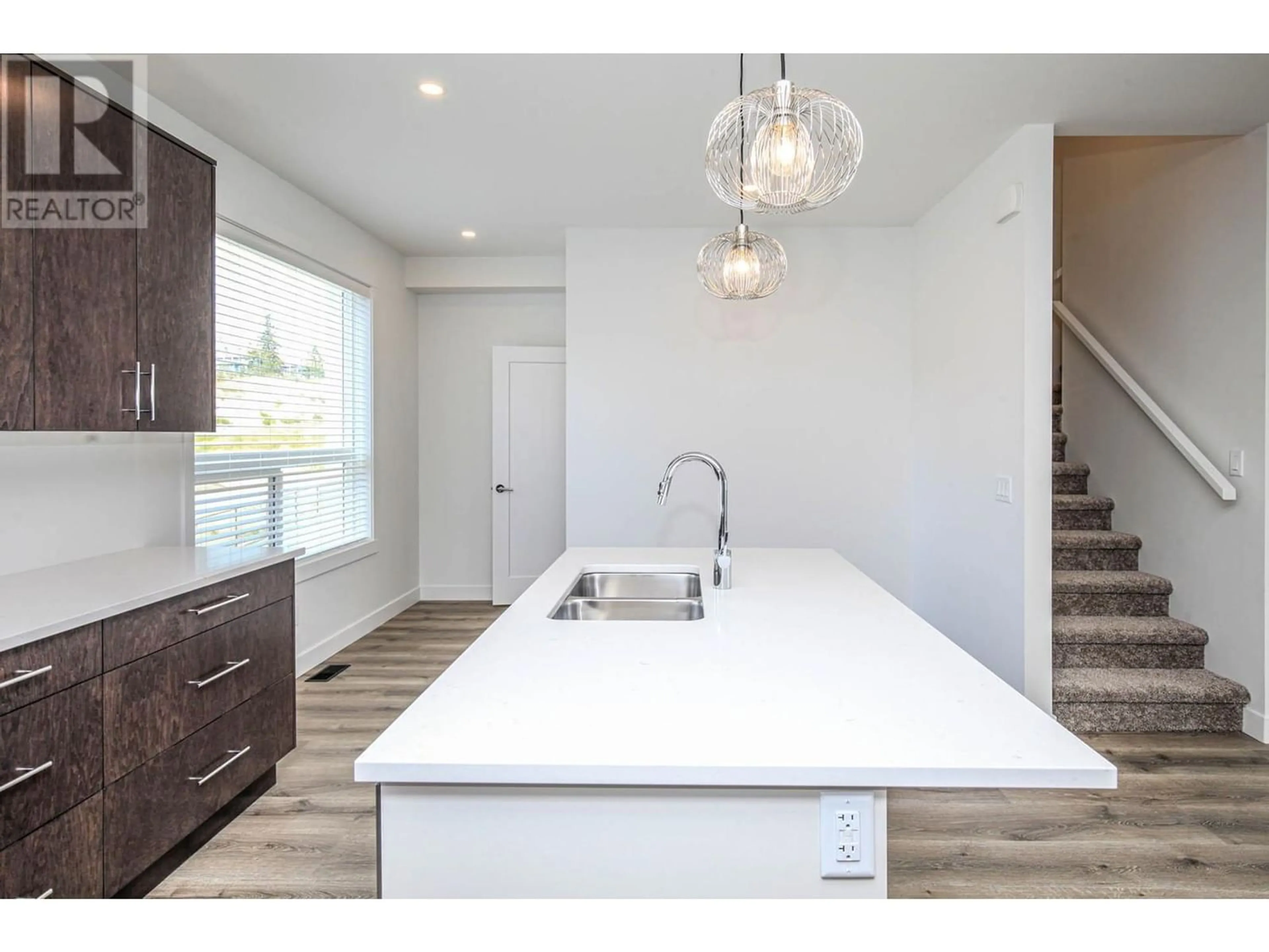 Open concept kitchen for 610 Academy Way Unit# 123, Kelowna British Columbia V1V3A4