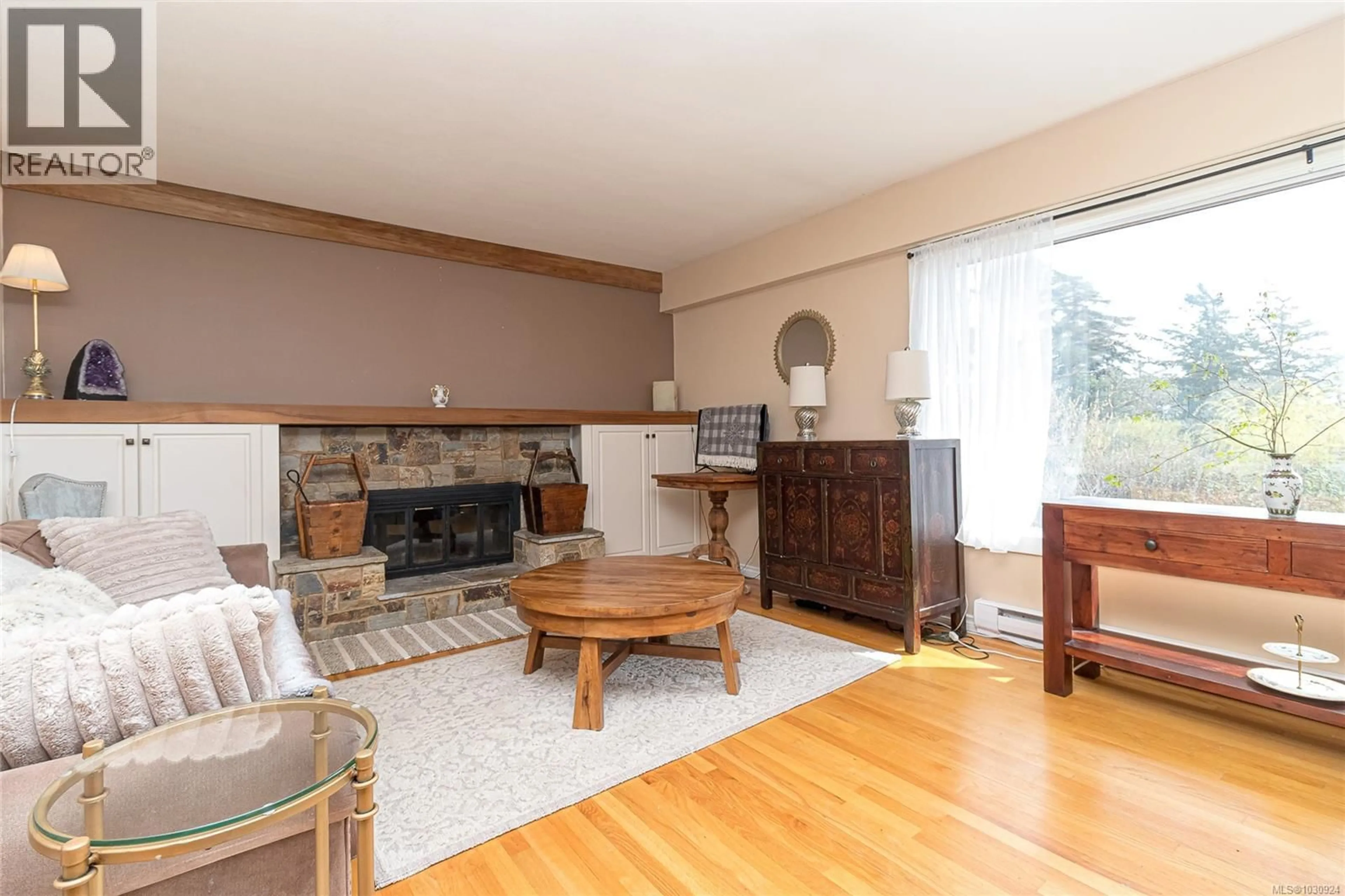 Living room with furniture, wood/laminate floor for 3931 CIRCLE DRIVE, Metchosin British Columbia V9C4A9