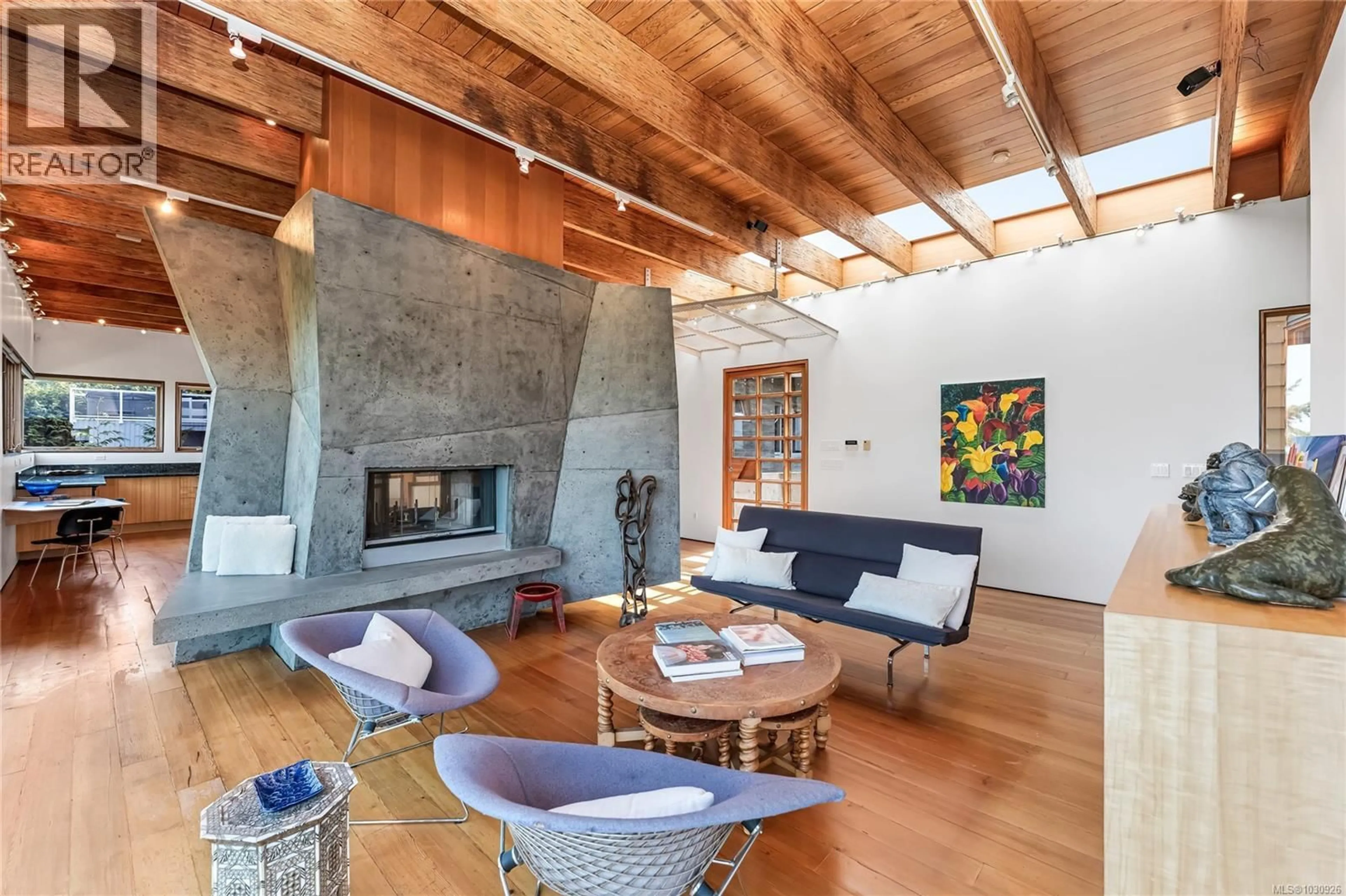 Living room with furniture, cement floor for 8909 PARK PACIFIC TERRACE, North Saanich British Columbia V8L5B1