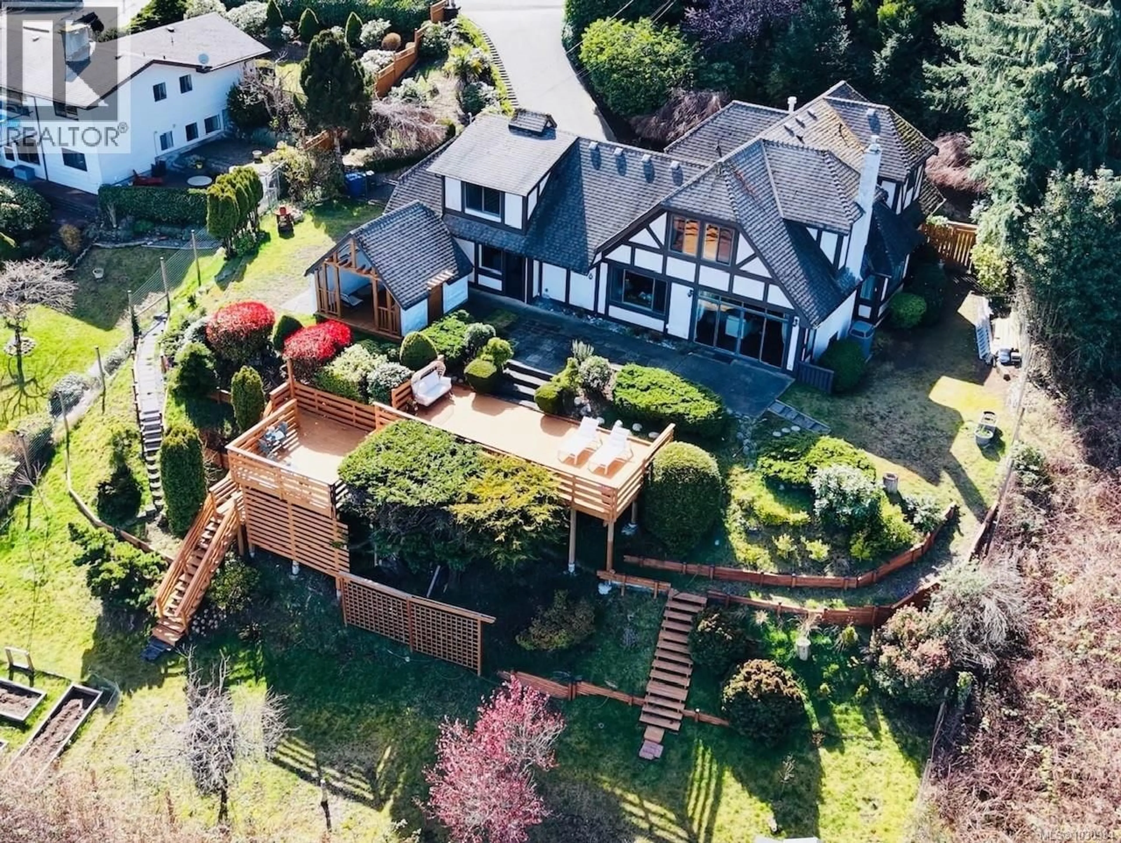 A pic from outside/outdoor area/front of a property/back of a property/a pic from drone, street for 5246 LOST LAKE ROAD, Nanaimo British Columbia V9T5E5