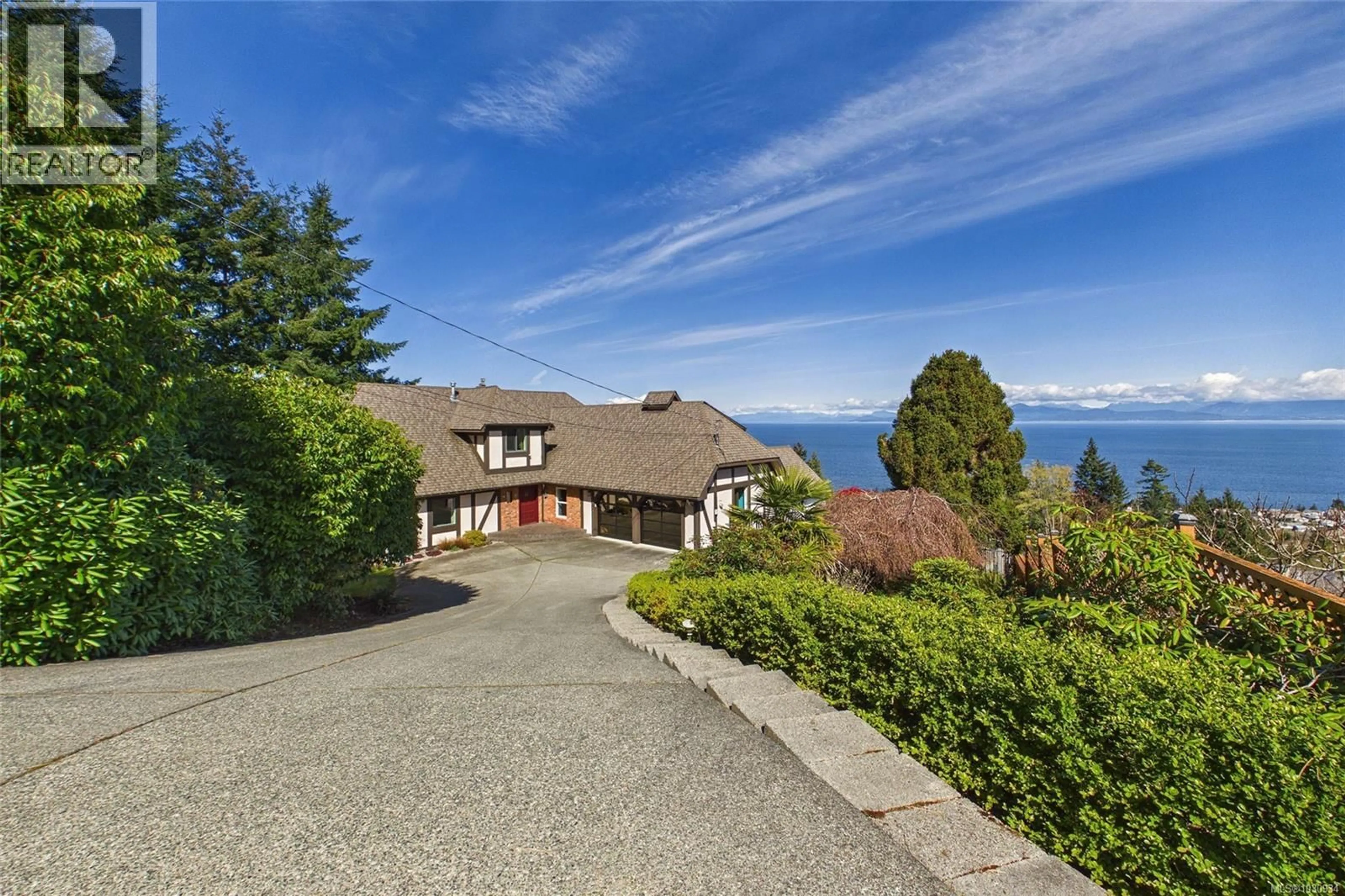 A pic from outside/outdoor area/front of a property/back of a property/a pic from drone, water/lake/river/ocean view for 5246 LOST LAKE ROAD, Nanaimo British Columbia V9T5E5