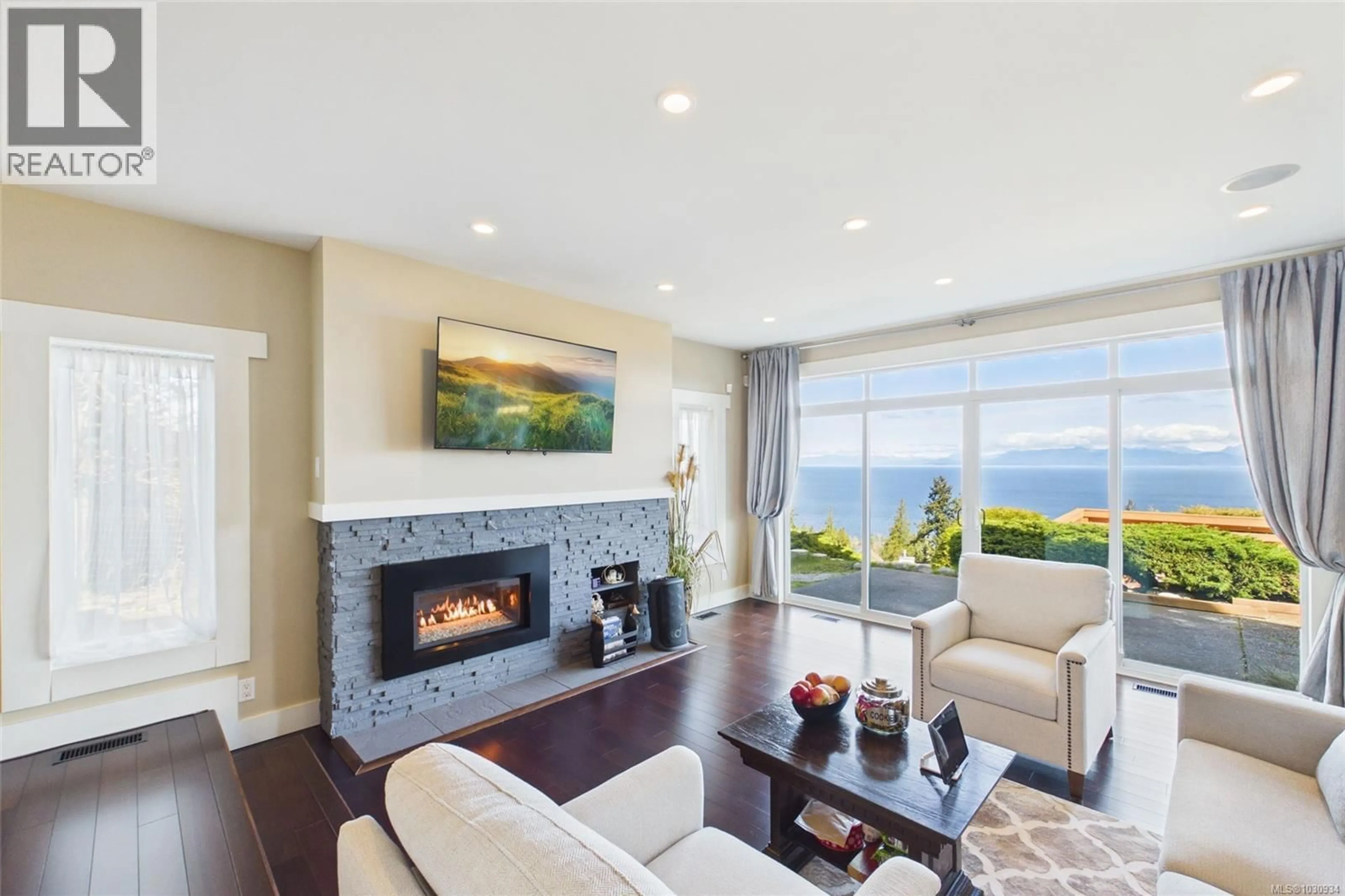 Living room with furniture, unknown for 5246 LOST LAKE ROAD, Nanaimo British Columbia V9T5E5