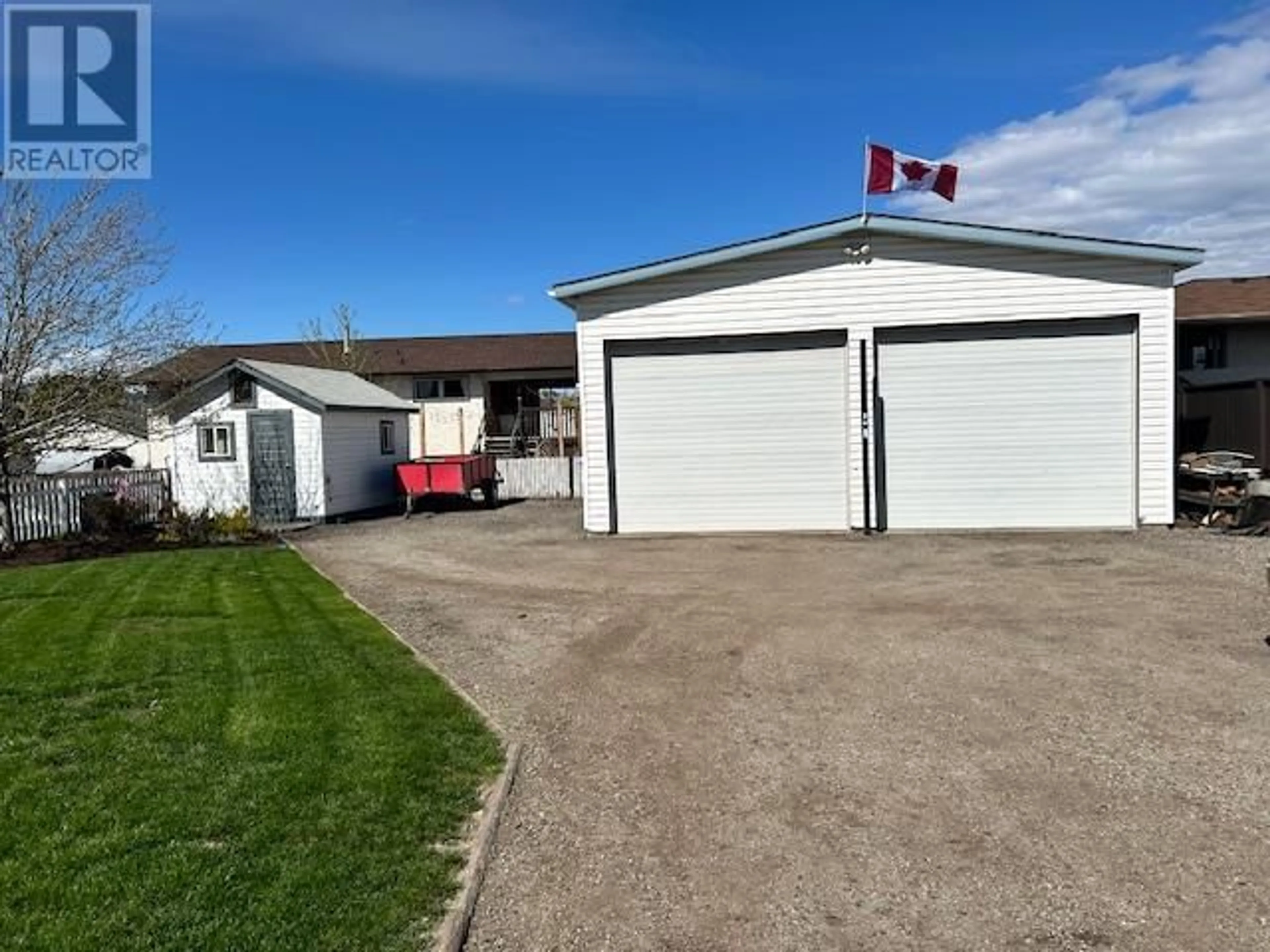 A pic from outside/outdoor area/front of a property/back of a property/a pic from drone, street for 400 McCurdy Road, Kelowna British Columbia V1X2P3