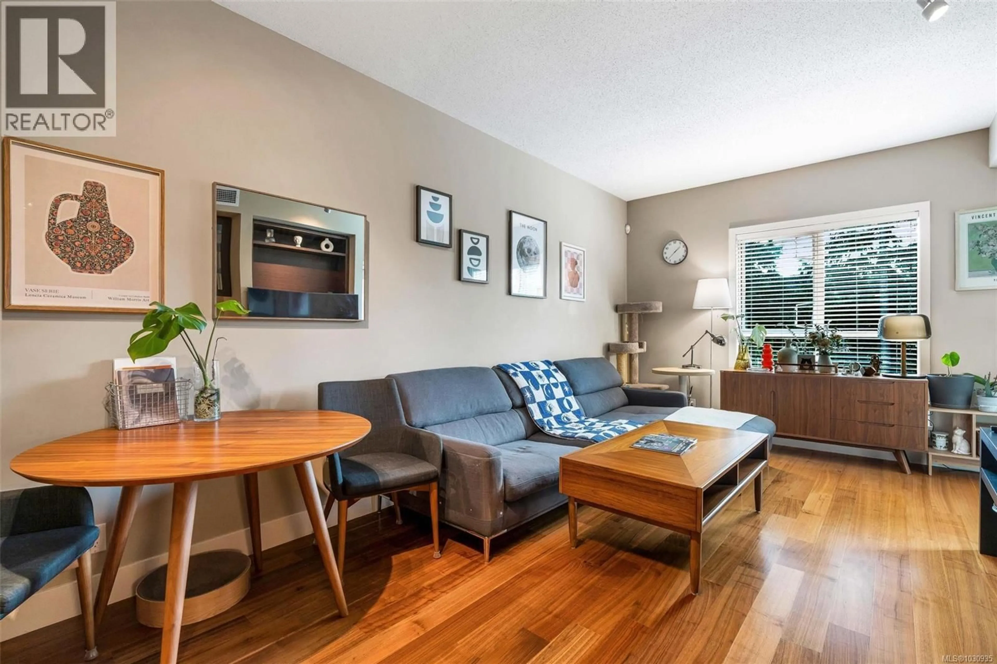 Living room with furniture, wood/laminate floor for 414 - 1400 LYNBURNE PLACE, Langford British Columbia V9B0A4