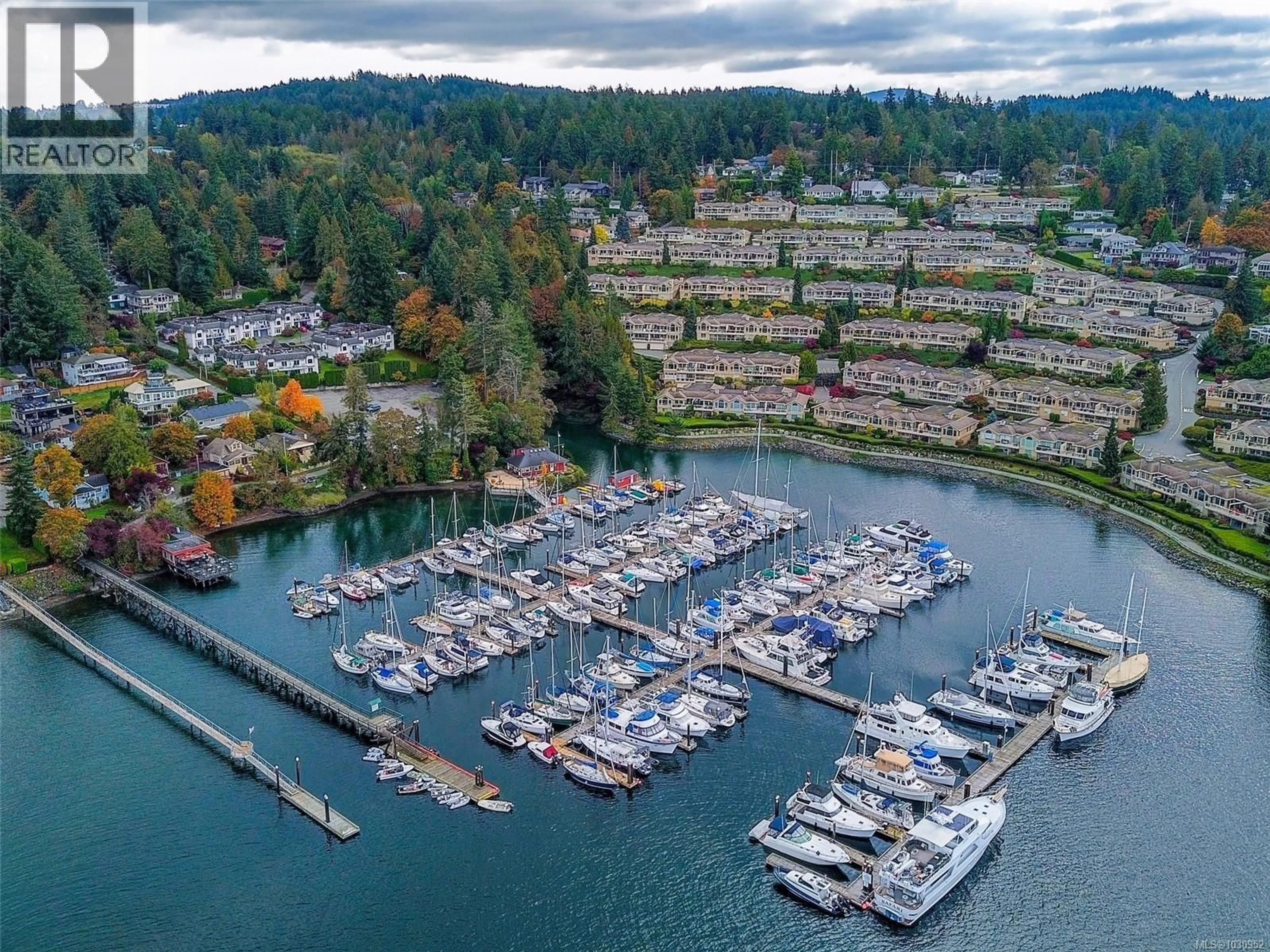 A pic from outside/outdoor area/front of a property/back of a property/a pic from drone, water/lake/river/ocean view for 104 - 6880 WALLACE DRIVE, Central Saanich British Columbia V0S1A0