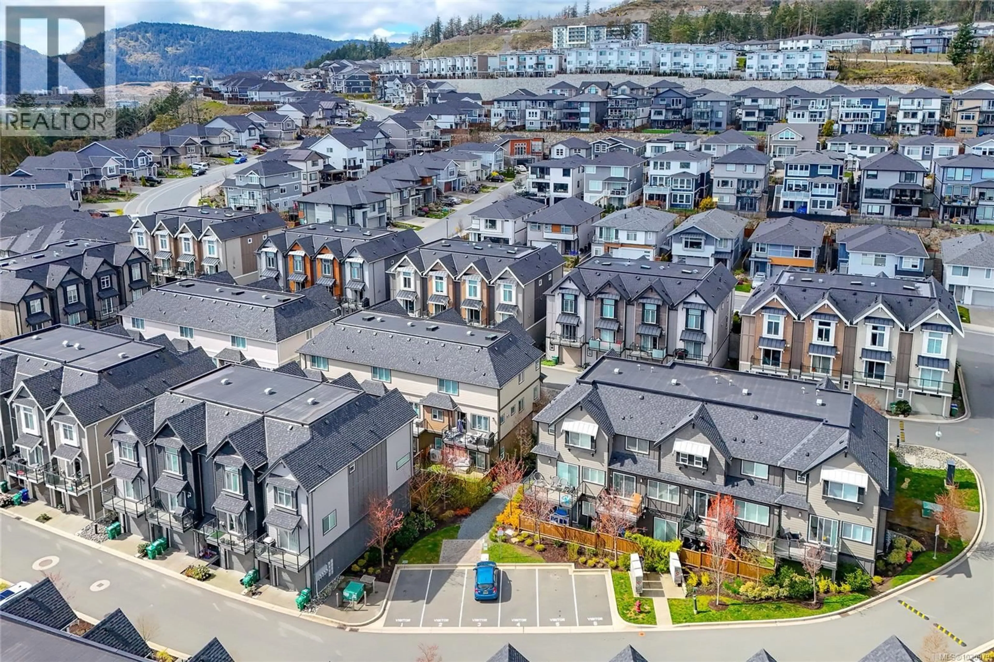 A pic from outside/outdoor area/front of a property/back of a property/a pic from drone, mountain view for 1212 MOONSTONE LOOP, Langford British Columbia V9B0Y6