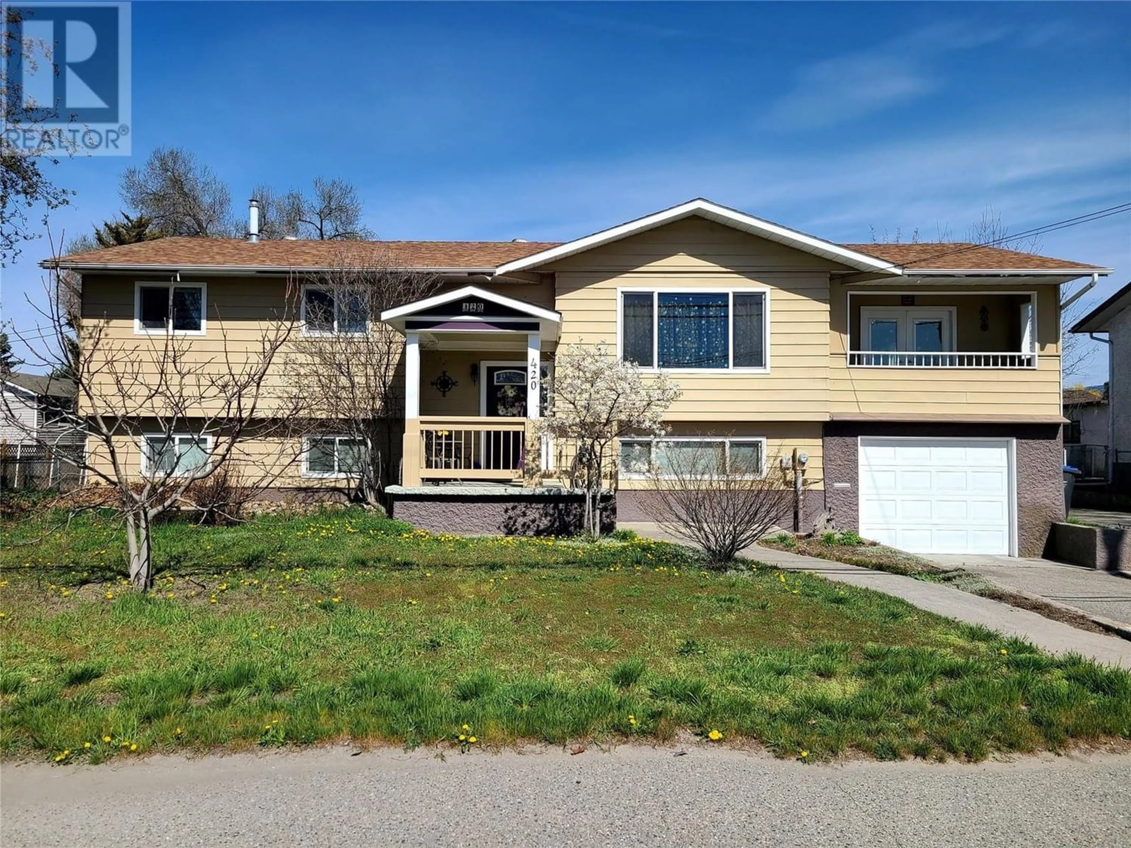 Frontside or backside of a home, the street view for 420 McCurdy Road, Kelowna British Columbia V1X2P3