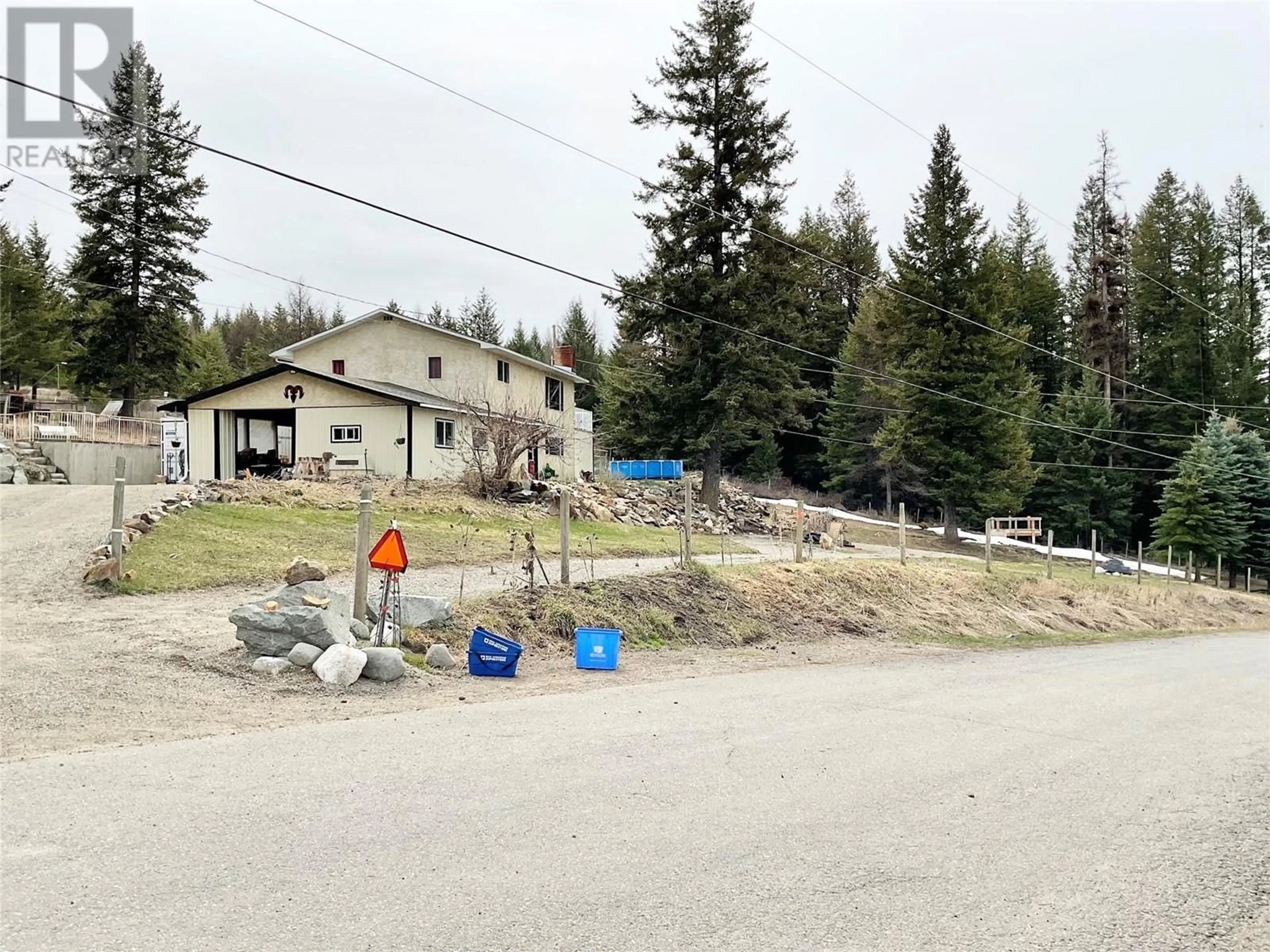 Frontside or backside of a home, the street view for 1414 Kelly Road, Bridesville British Columbia V0H1B0