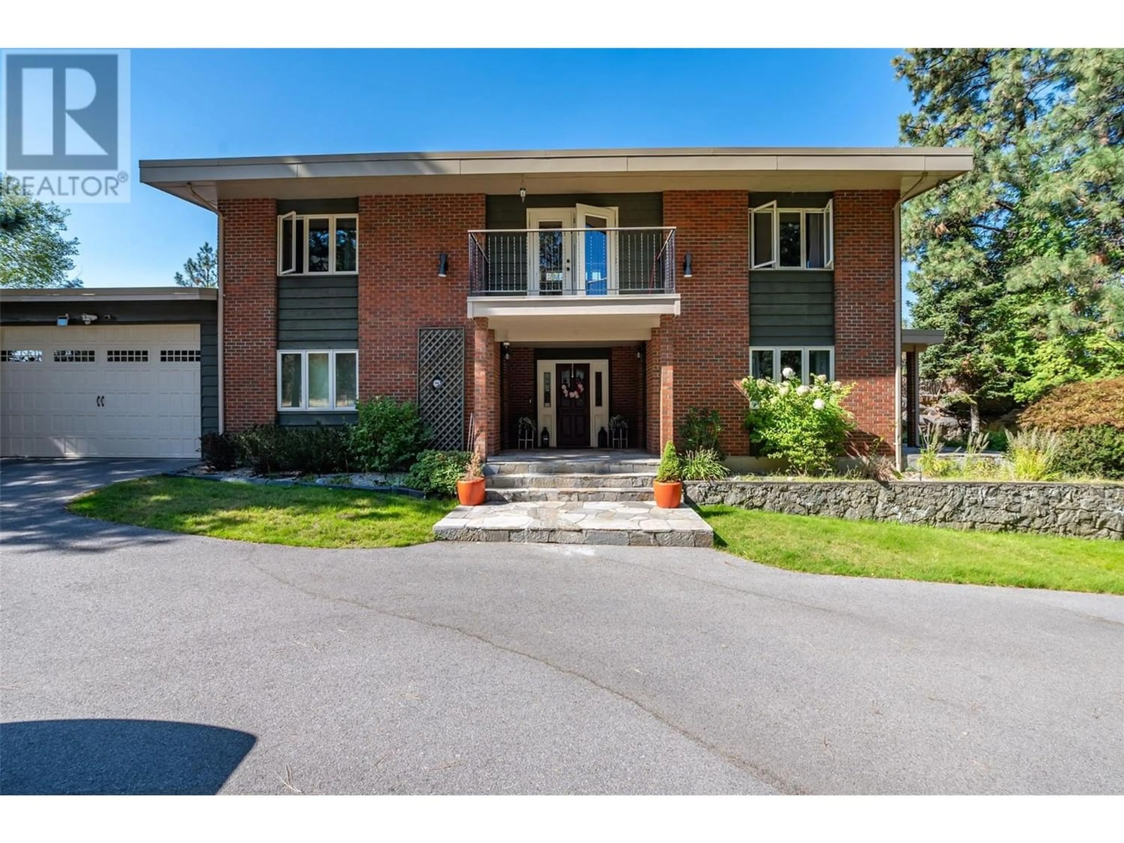 Home with brick exterior material for 4085 Valleyview Road, Penticton British Columbia V2A8V8