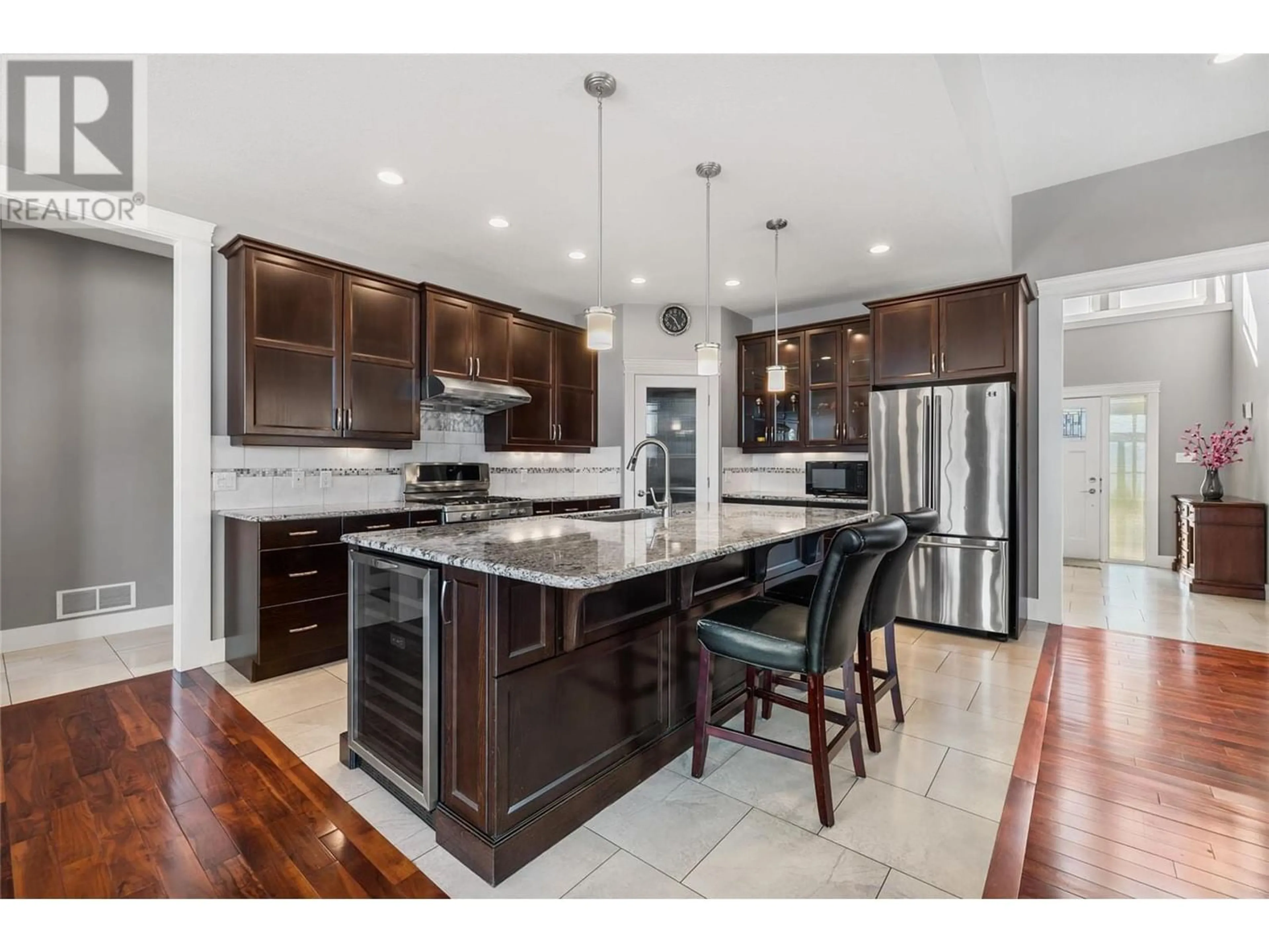 Open concept kitchen, ceramic/tile floor for 470 Trumpeter Road, Kelowna British Columbia V1W5J4