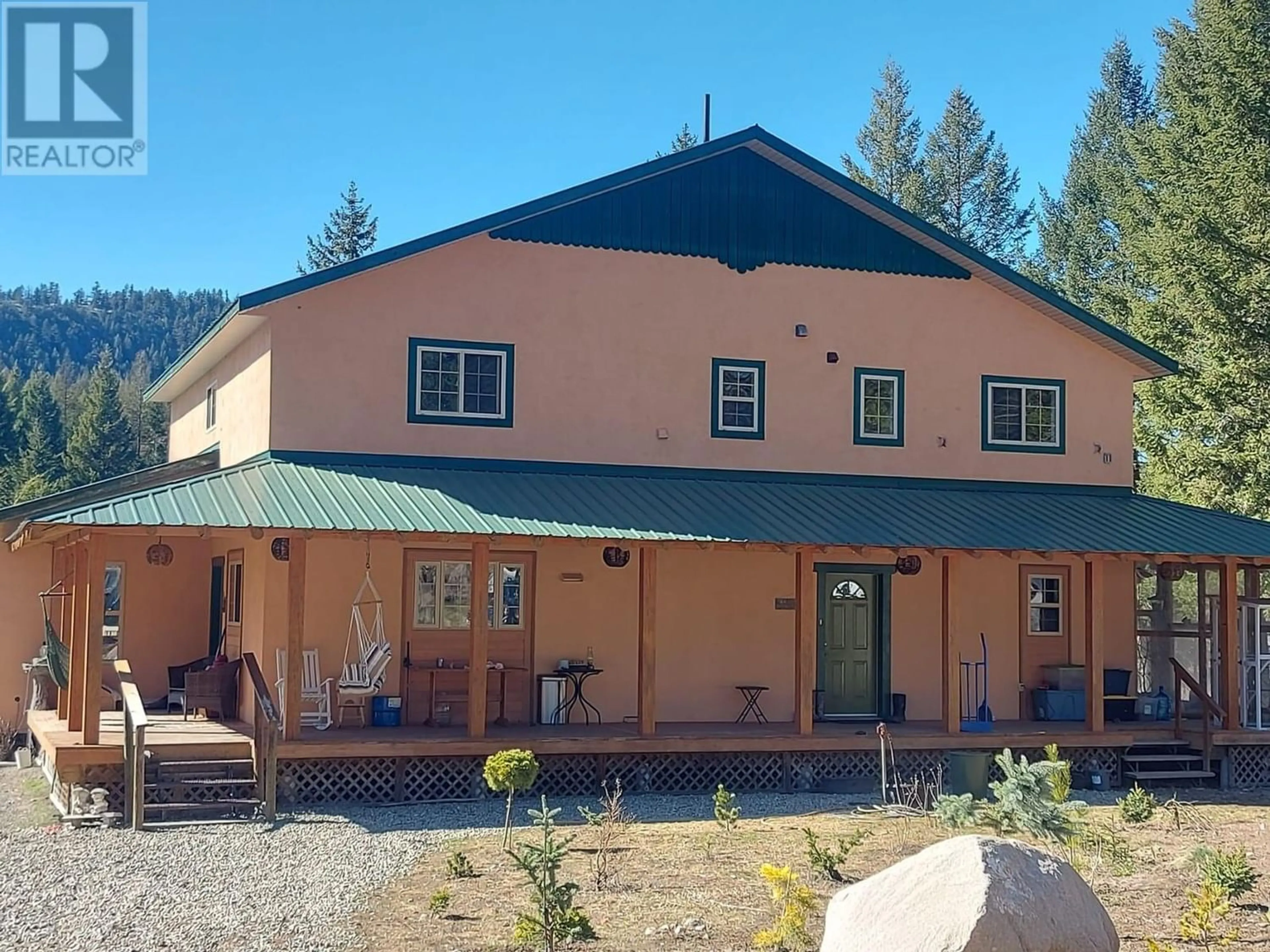 Frontside or backside of a home, the front or back of building for 1770 Johnstone Creek Road W, Rock Creek British Columbia V0H1Y0