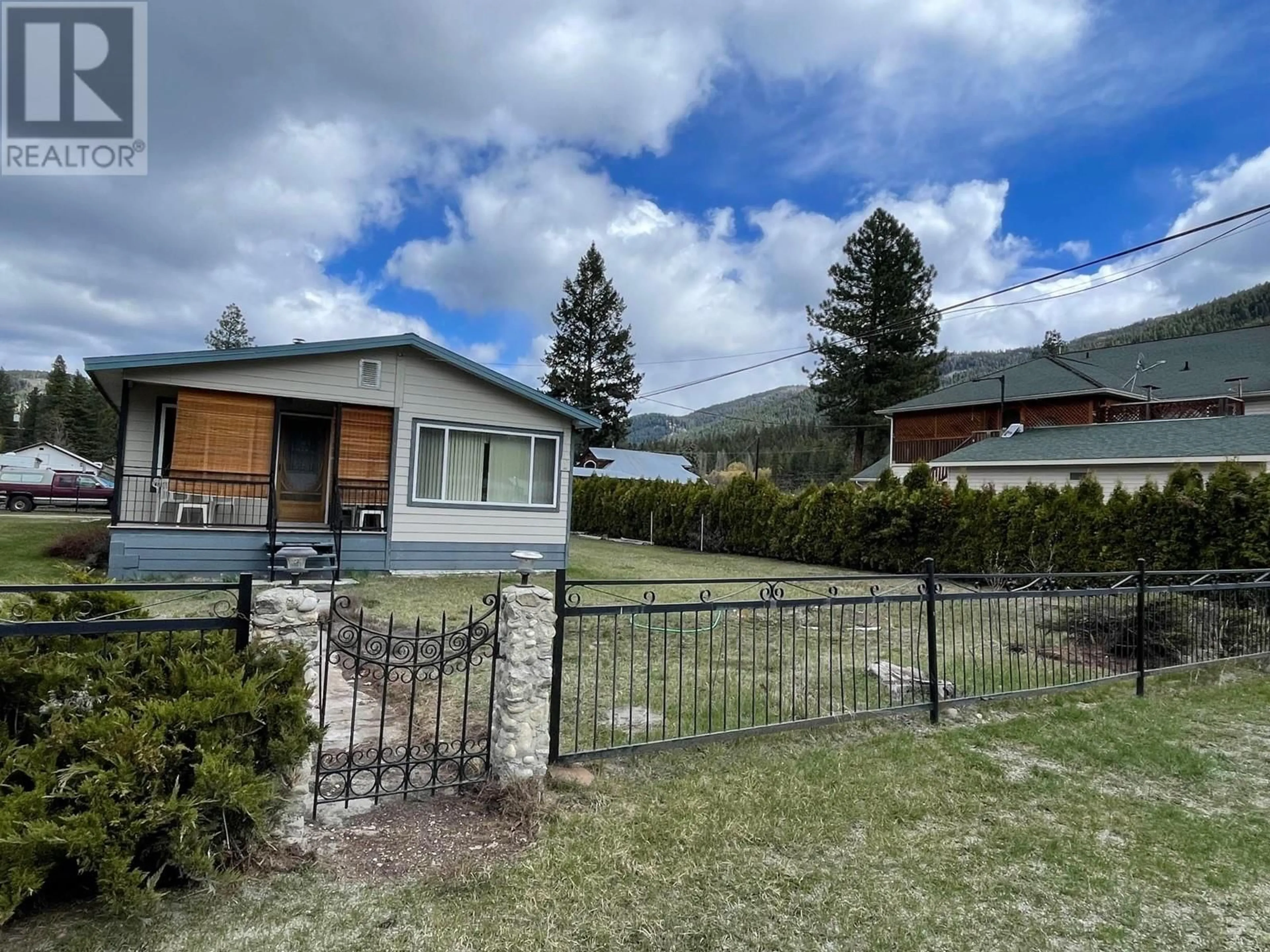 A pic from outside/outdoor area/front of a property/back of a property/a pic from drone, mountain view for 5834 3RD STREET, Beaverdell British Columbia V0H1A0