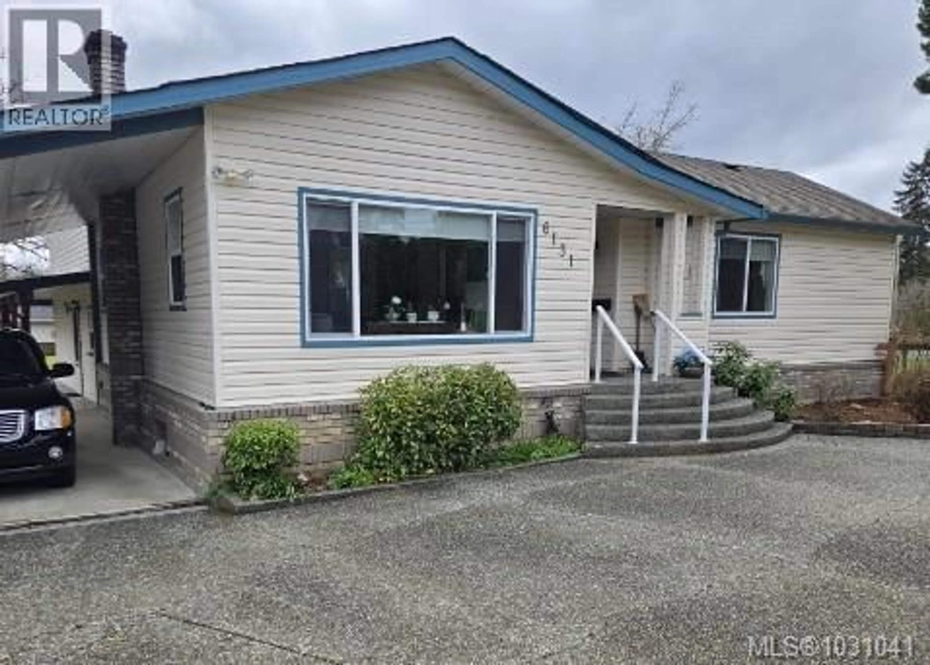 Home with vinyl exterior material, street for 6131 DRINKWATER ROAD, Port Alberni British Columbia V9Y8W6