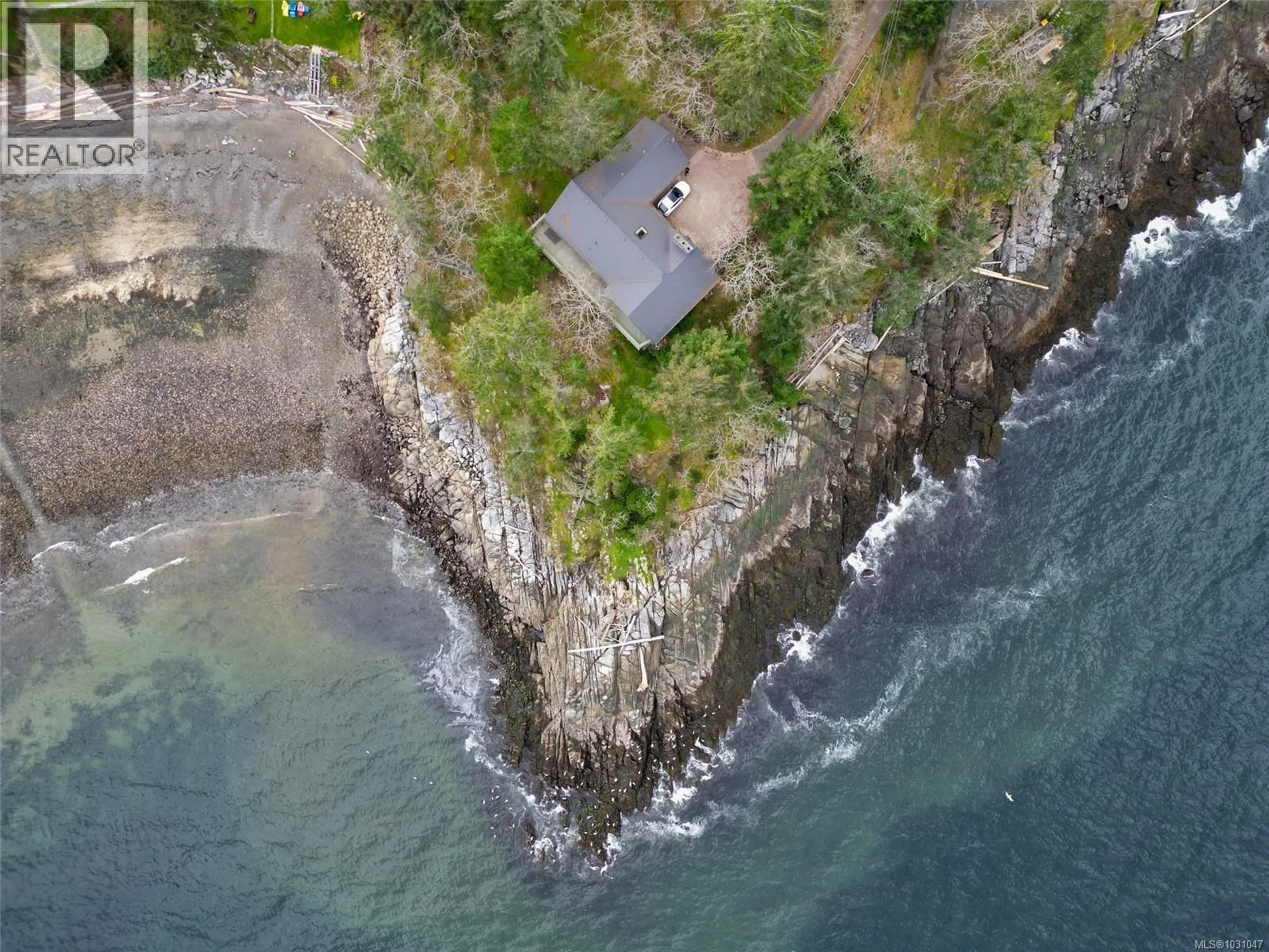 A pic from outside/outdoor area/front of a property/back of a property/a pic from drone, water/lake/river/ocean view for 3610 OUTRIGGER ROAD, Nanoose Bay British Columbia V9P9H3