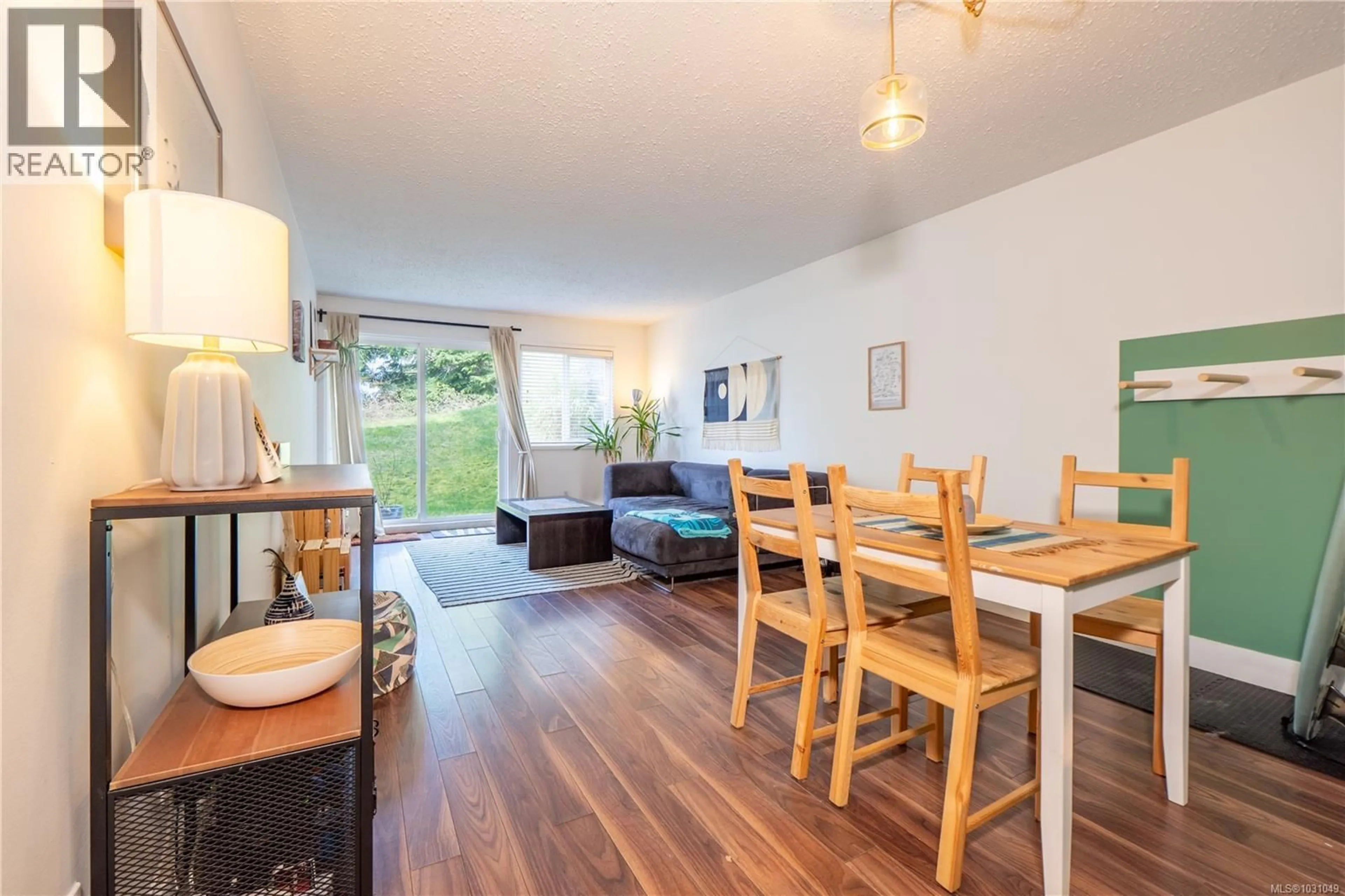 Dining room, wood/laminate floor for 107 - 250 HEMLOCK STREET, Ucluelet British Columbia V0R3A0