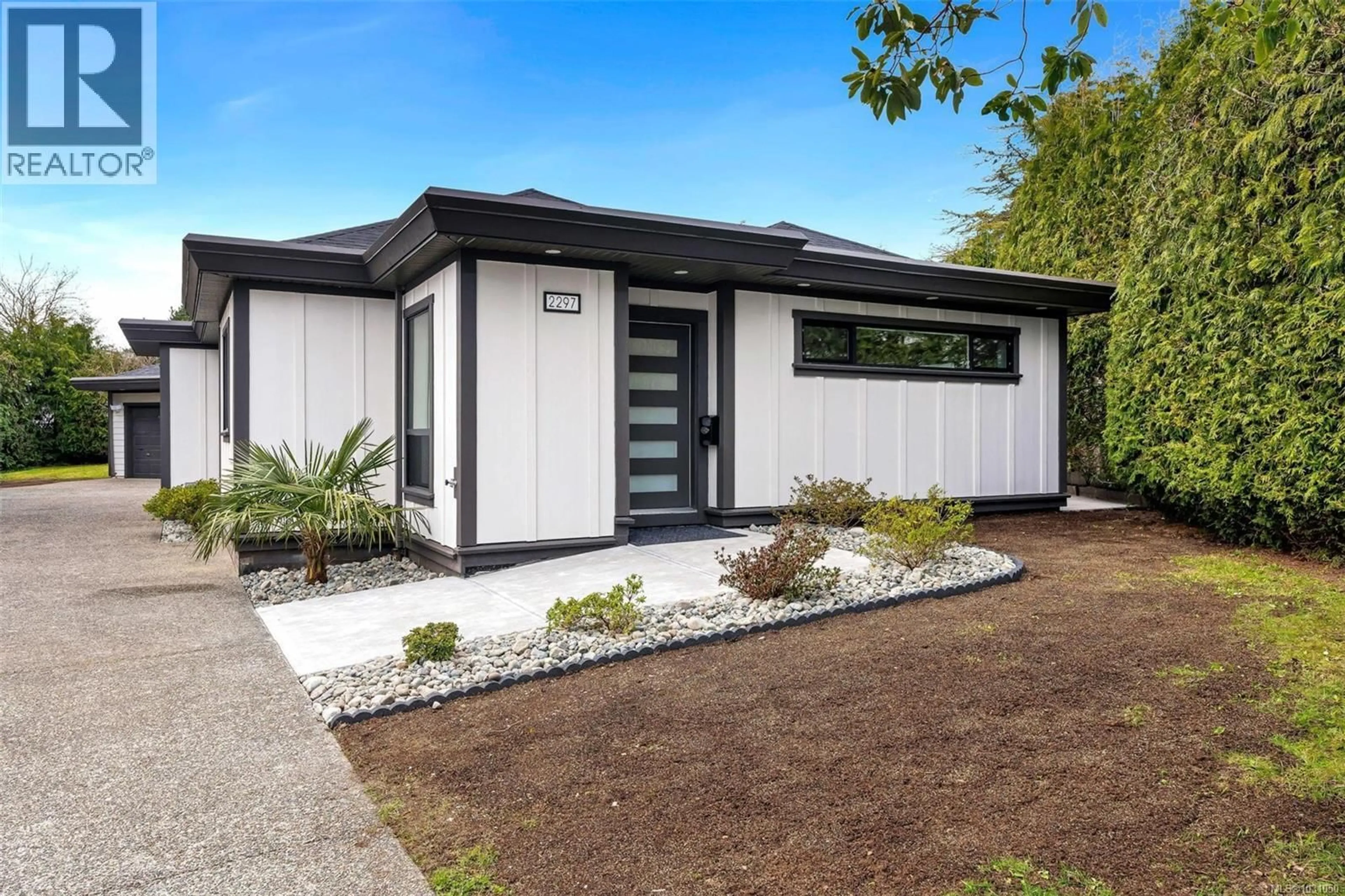 Home with vinyl exterior material, street for 2297 COVINGTON PLACE, Saanich British Columbia V8N5R1
