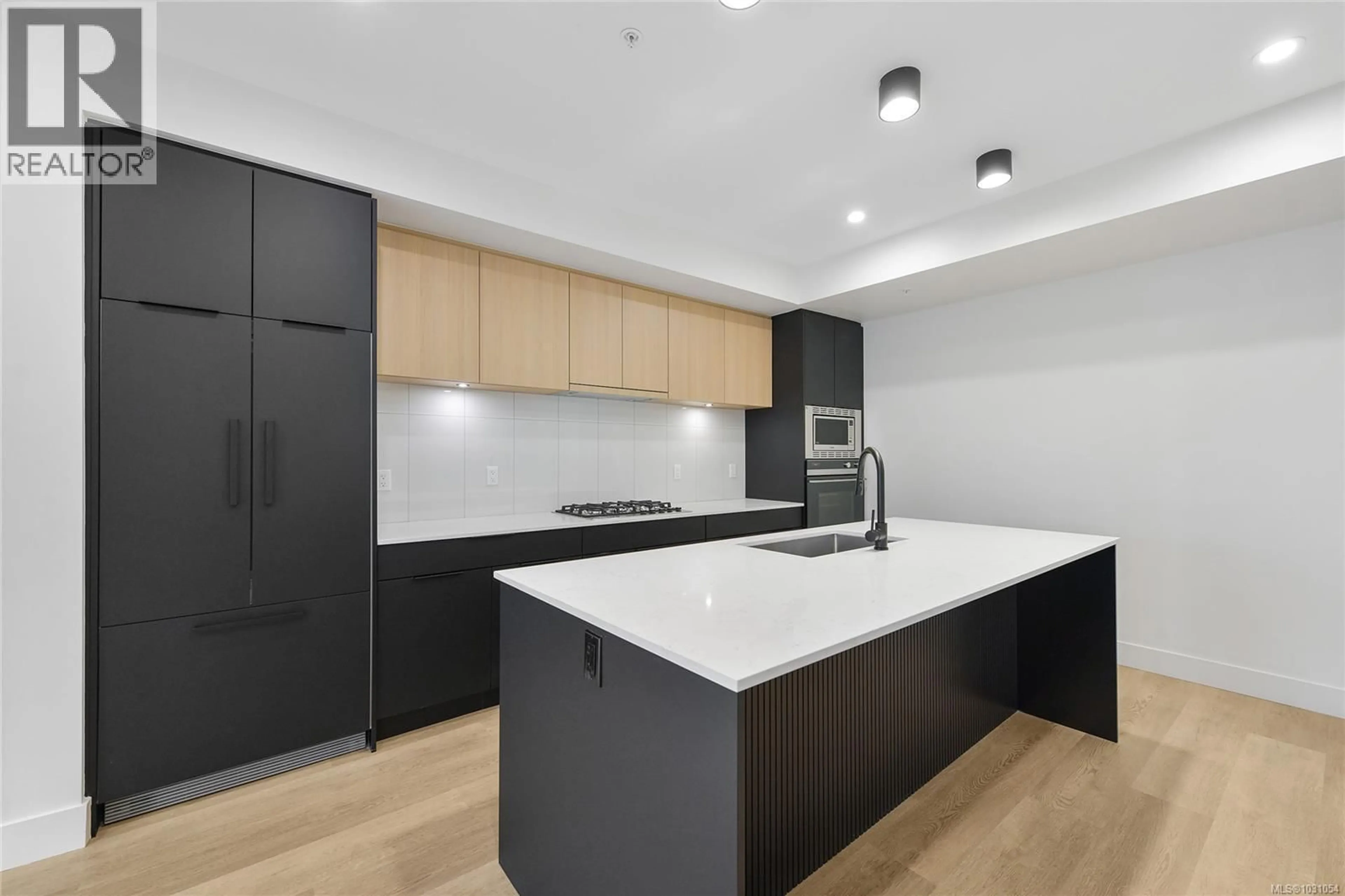 Open concept kitchen, unknown for 314 - 2341 BEAR MOUNTAIN PARKWAY, Langford British Columbia V9B6V1