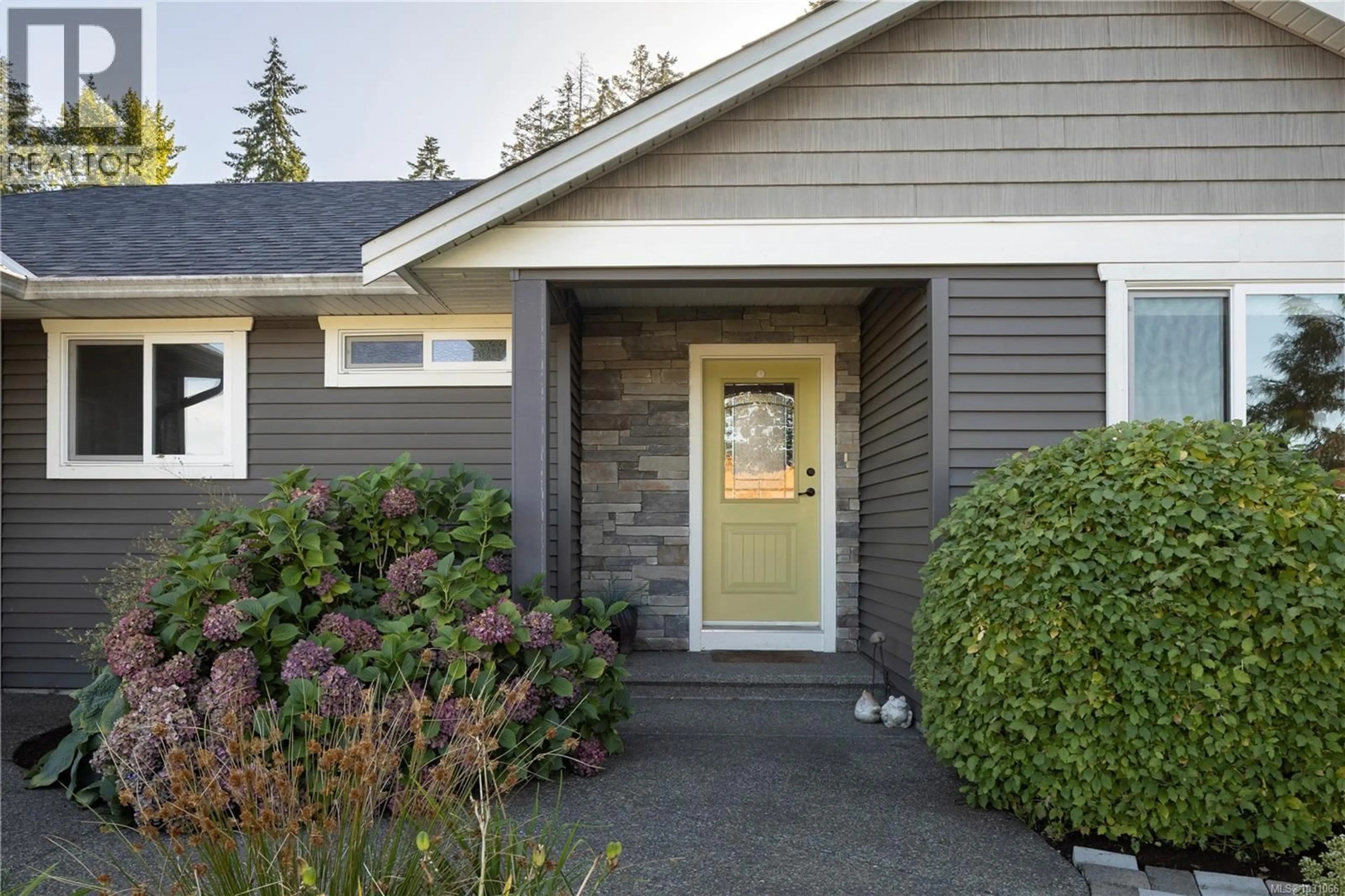 Home with vinyl exterior material, street for 2065 MORELLO PLACE, Courtenay British Columbia V9N9C9