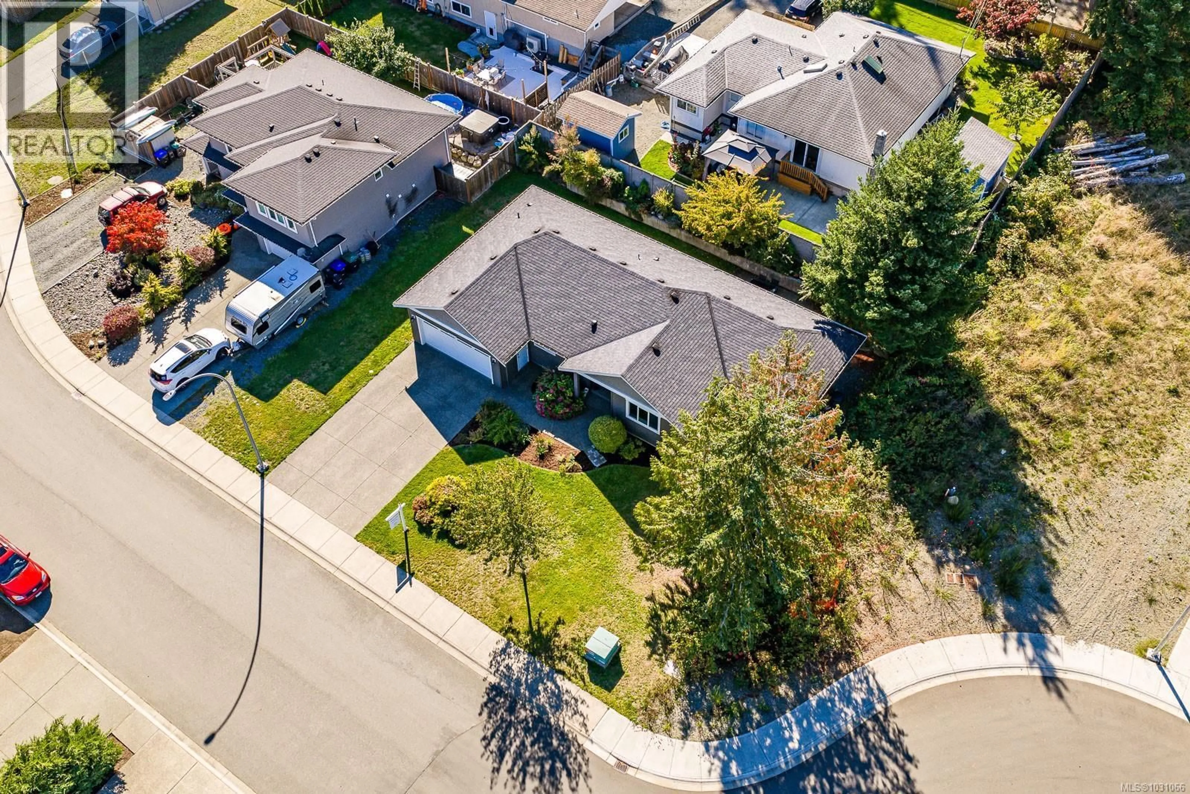 A pic from outside/outdoor area/front of a property/back of a property/a pic from drone, street for 2065 MORELLO PLACE, Courtenay British Columbia V9N9C9