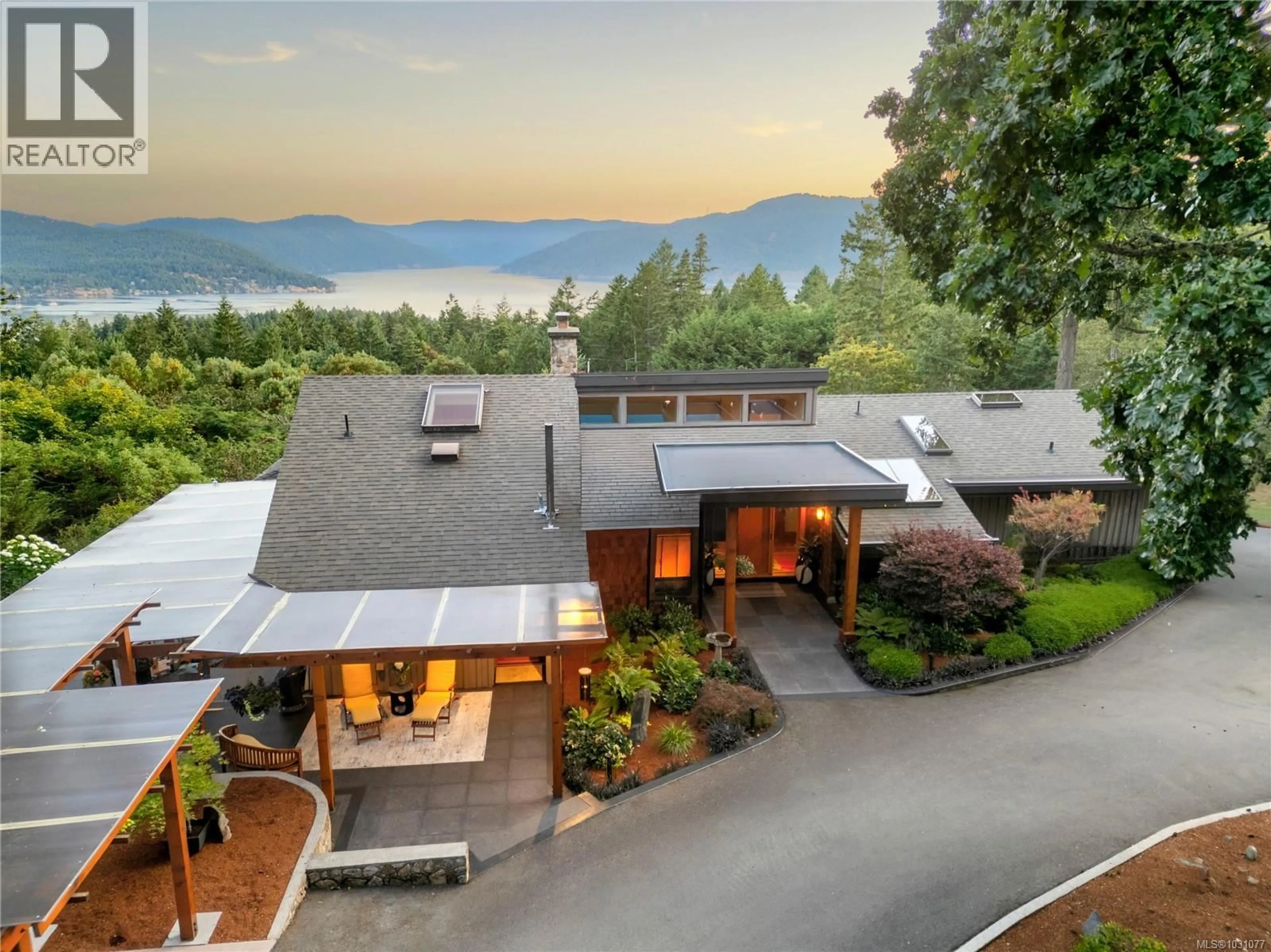 A pic from outside/outdoor area/front of a property/back of a property/a pic from drone, mountain view for 8100 WOODWYN TERRACE, Central Saanich British Columbia V8M1S2