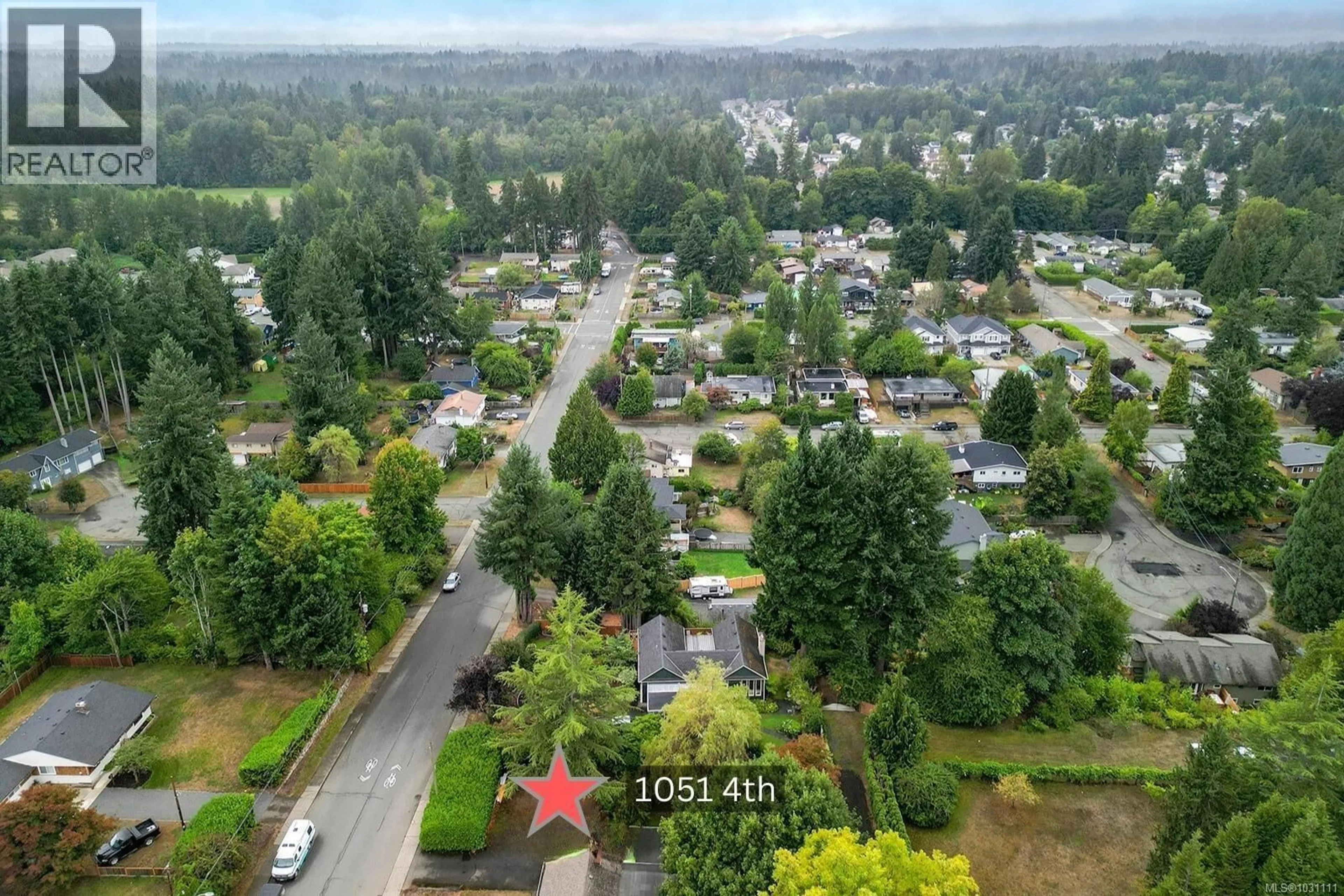 A pic from outside/outdoor area/front of a property/back of a property/a pic from drone, unknown for D - 1051 4TH STREET, Courtenay British Columbia V9N1H6