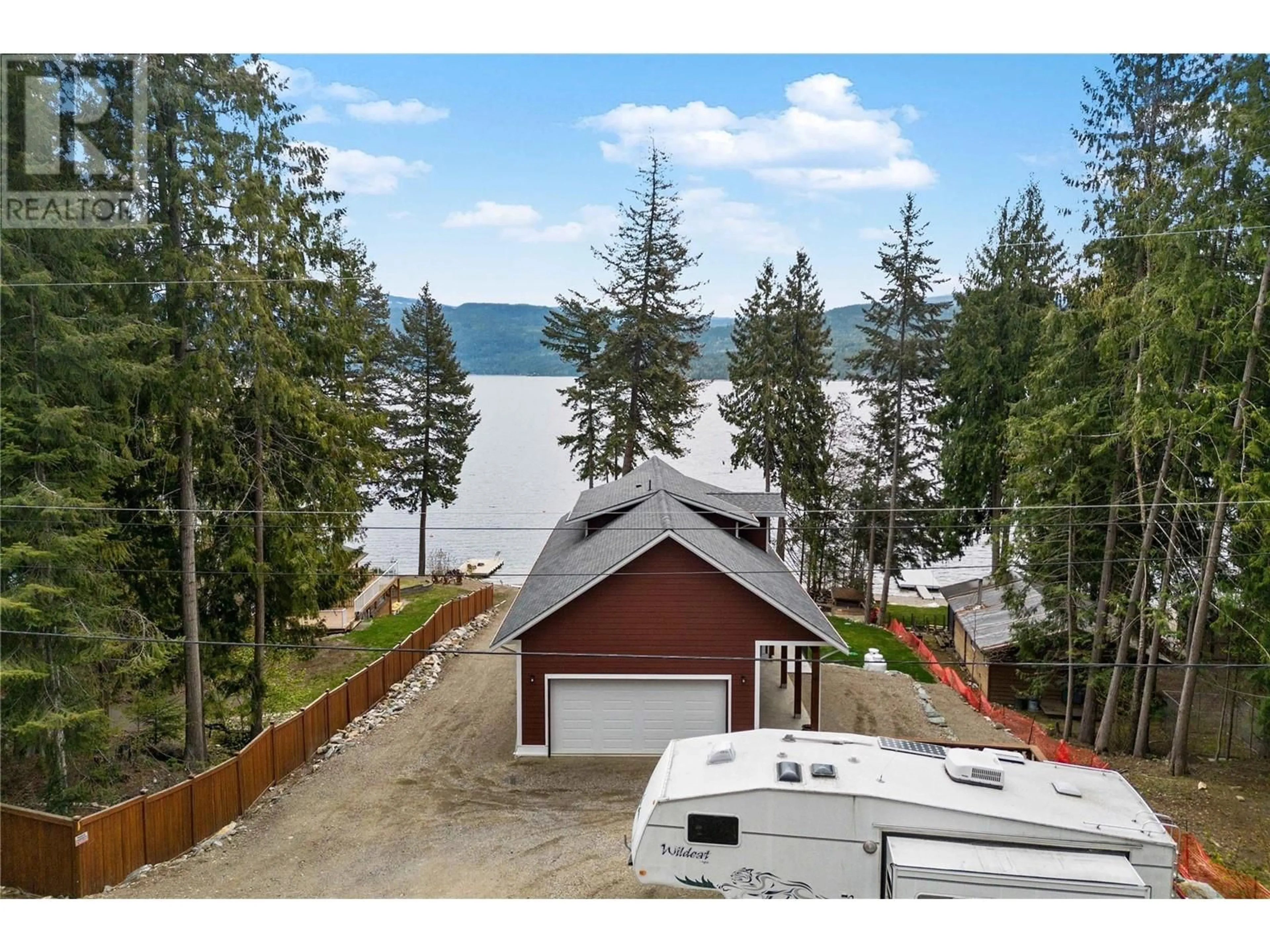 A pic from outside/outdoor area/front of a property/back of a property/a pic from drone, water/lake/river/ocean view for 7918 GARDINER ROAD, Anglemont British Columbia V0E1M8