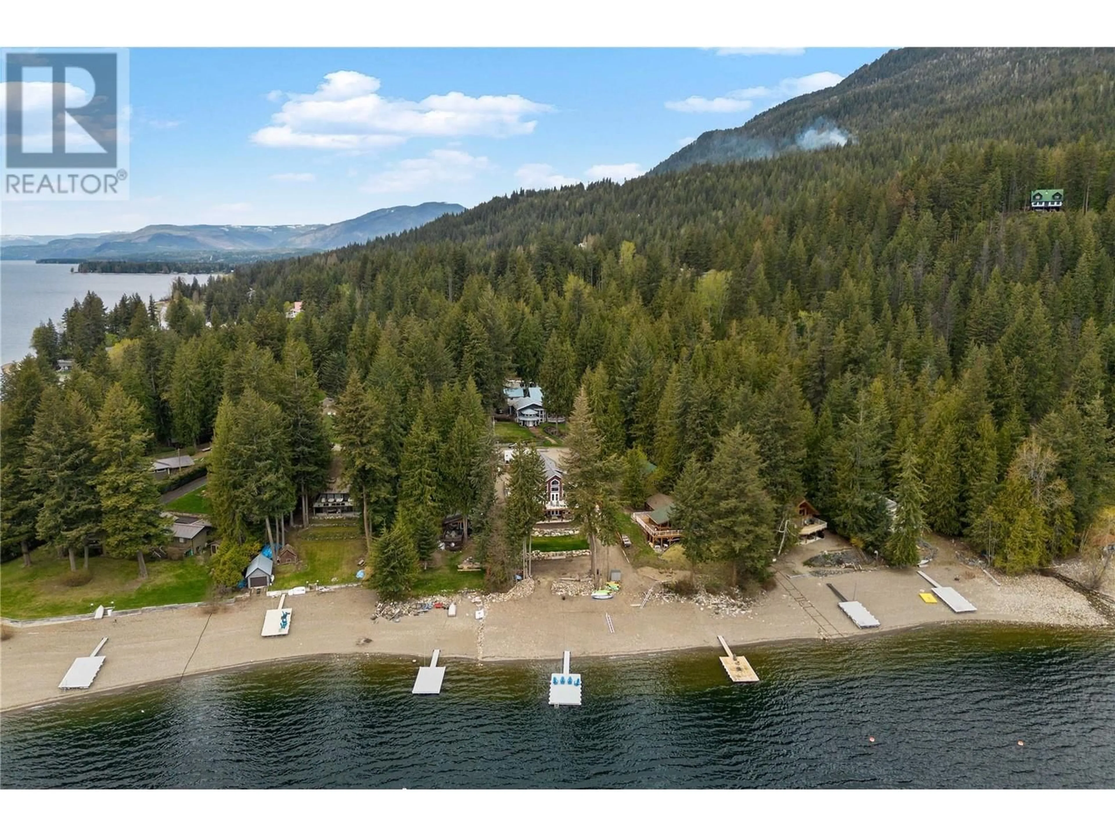 A pic from outside/outdoor area/front of a property/back of a property/a pic from drone, water/lake/river/ocean view for 7918 GARDINER ROAD, Anglemont British Columbia V0E1M8