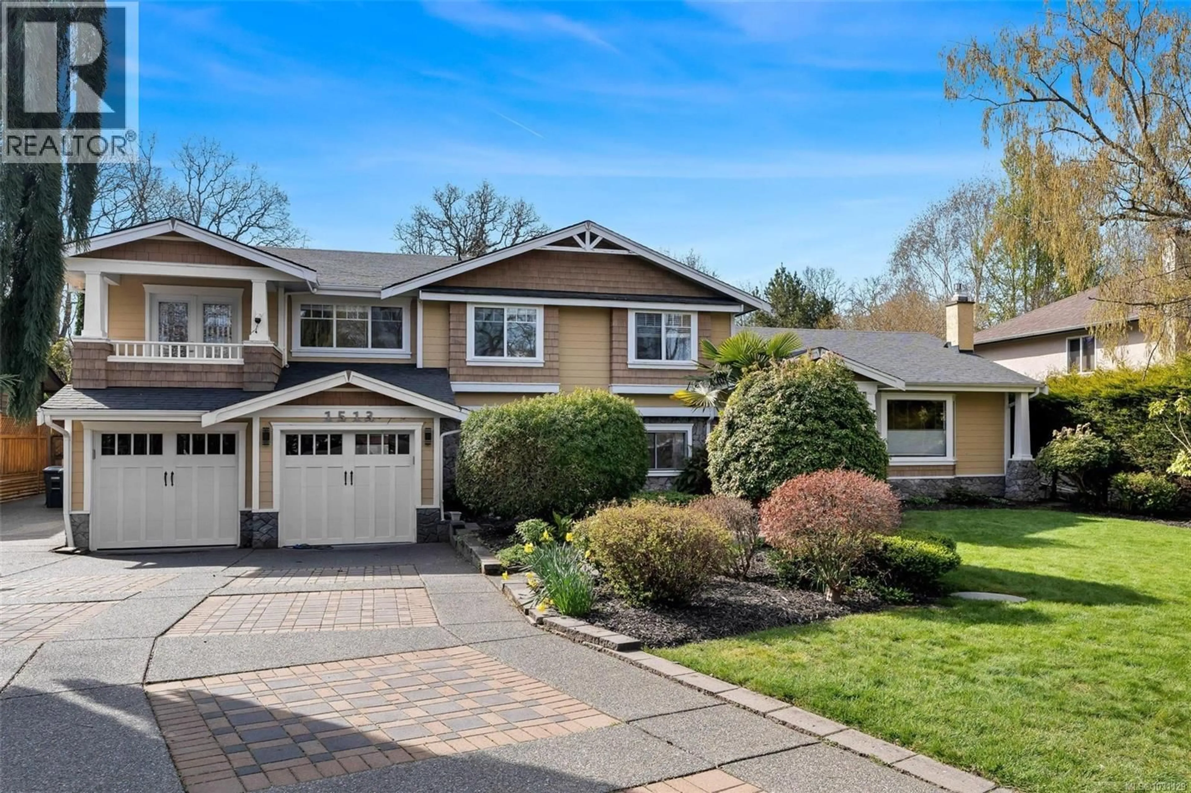 Home with vinyl exterior material, street for 1513 ERIC ROAD, Saanich British Columbia V8N5Y6