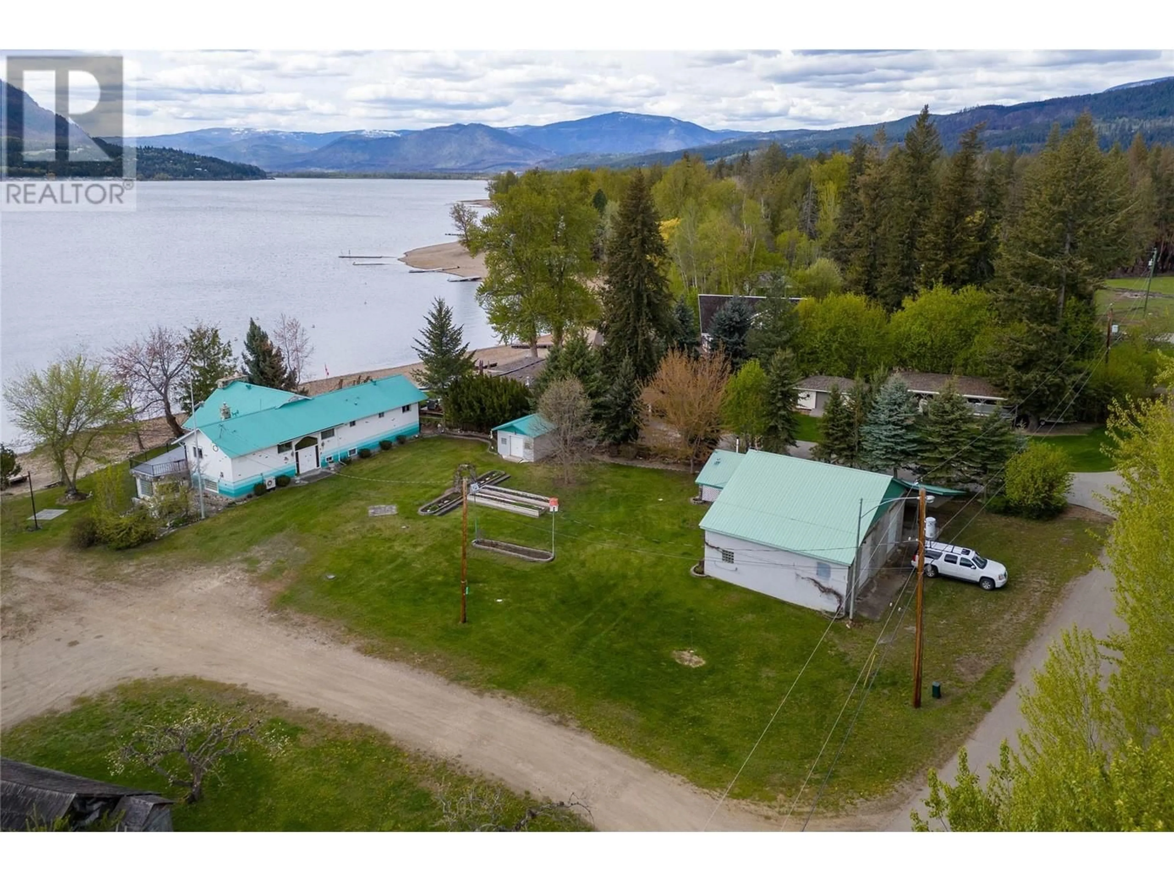 A pic from outside/outdoor area/front of a property/back of a property/a pic from drone, water/lake/river/ocean view for 3726 ZINCK ROAD, Scotch Creek British Columbia V0E1M5
